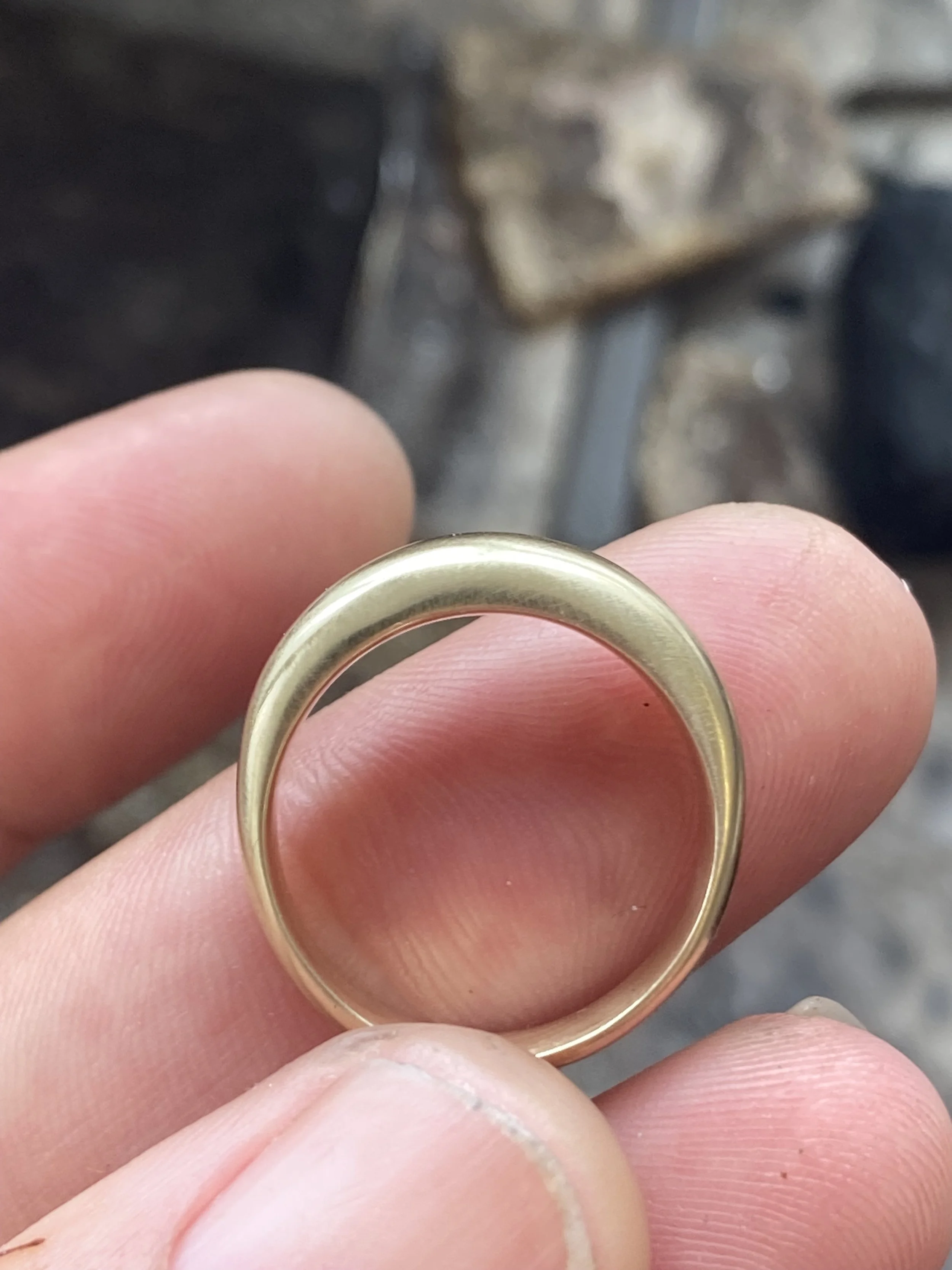 Solid 9ct gold bombe ring cast and polished before stone setting for a bespoke engagement ring
