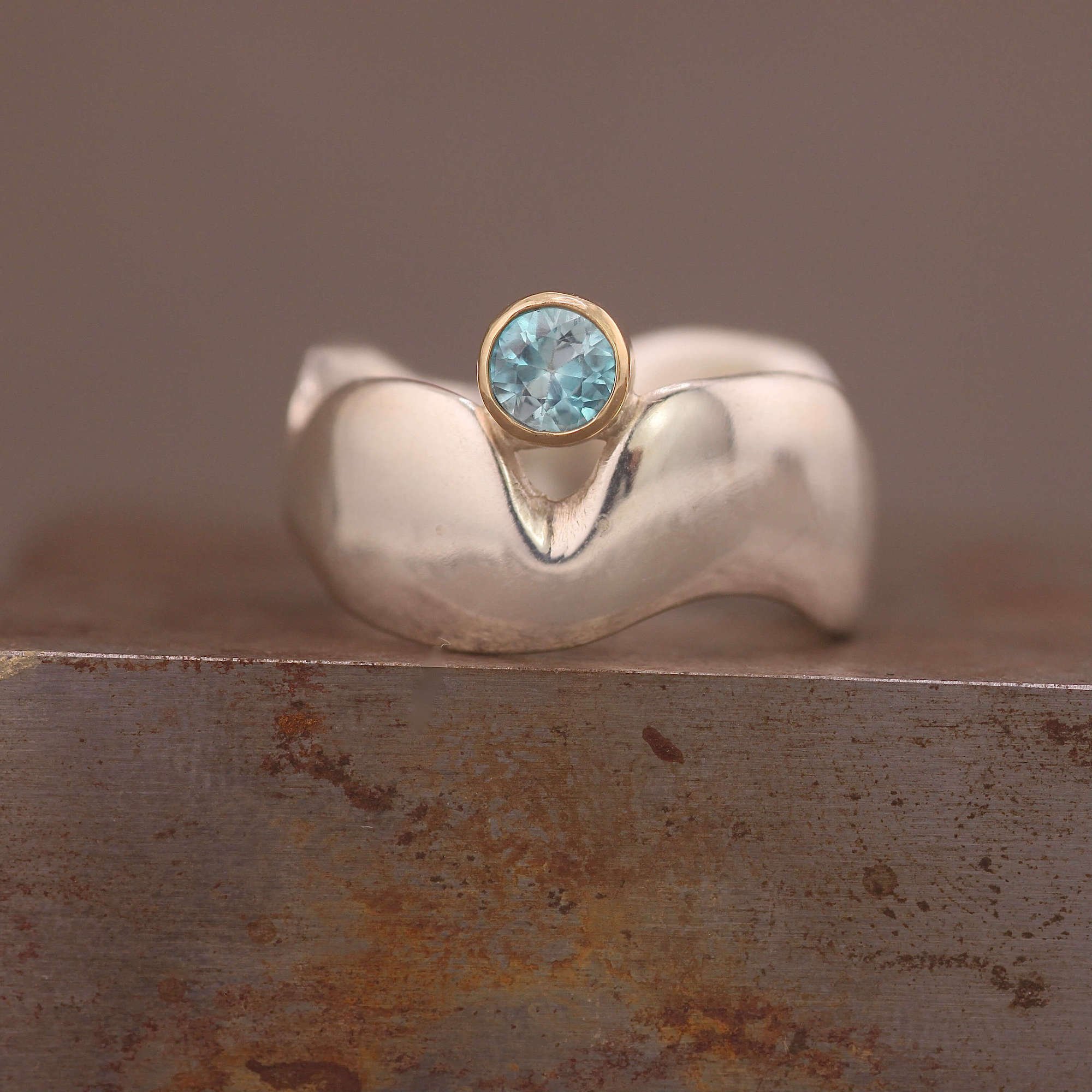 Blue zircon silver 9ct gold round wide surrealist ring.JPG