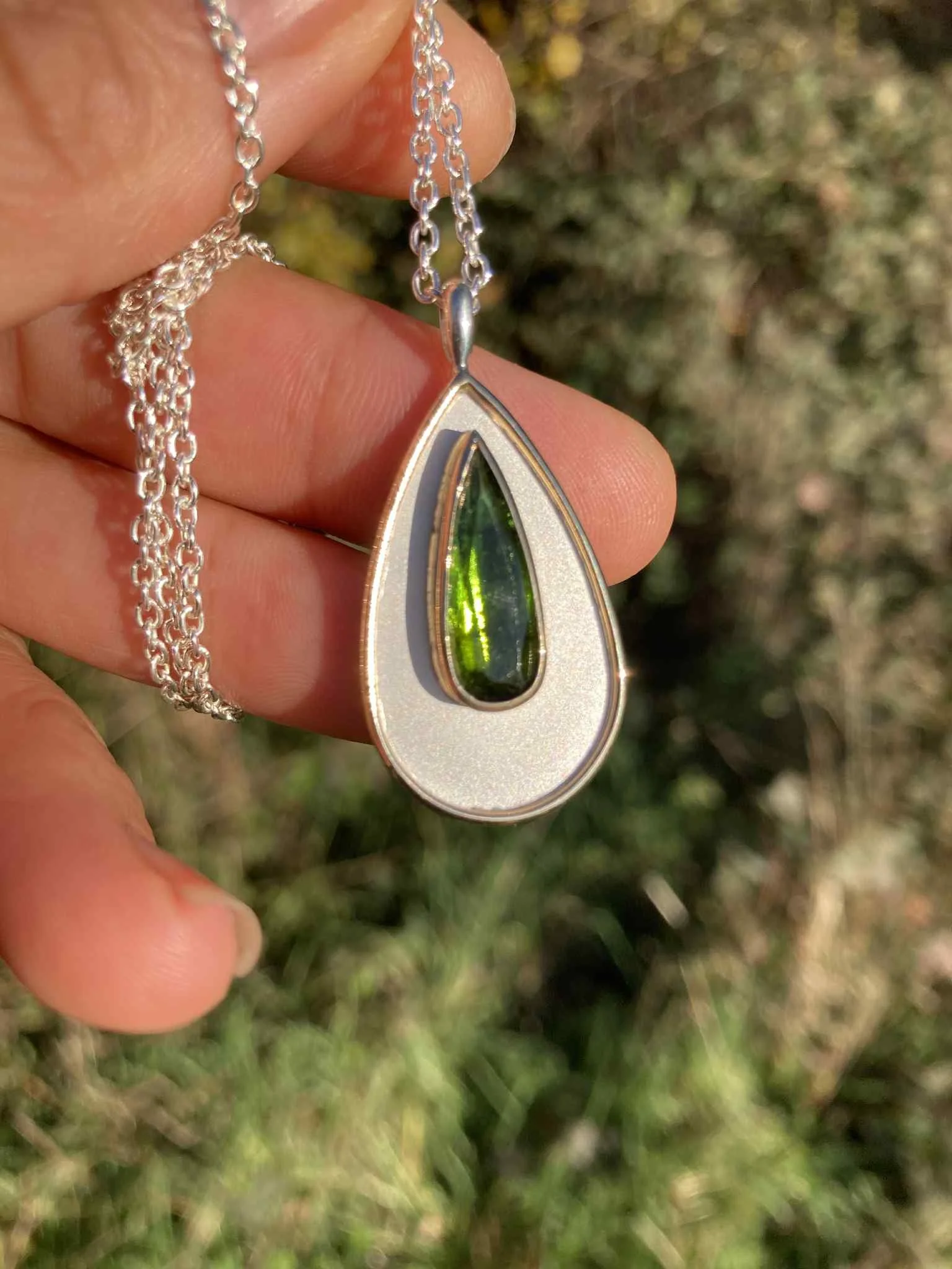 green tourmaline pear shaped silver 14ct gold pendant.jpeg