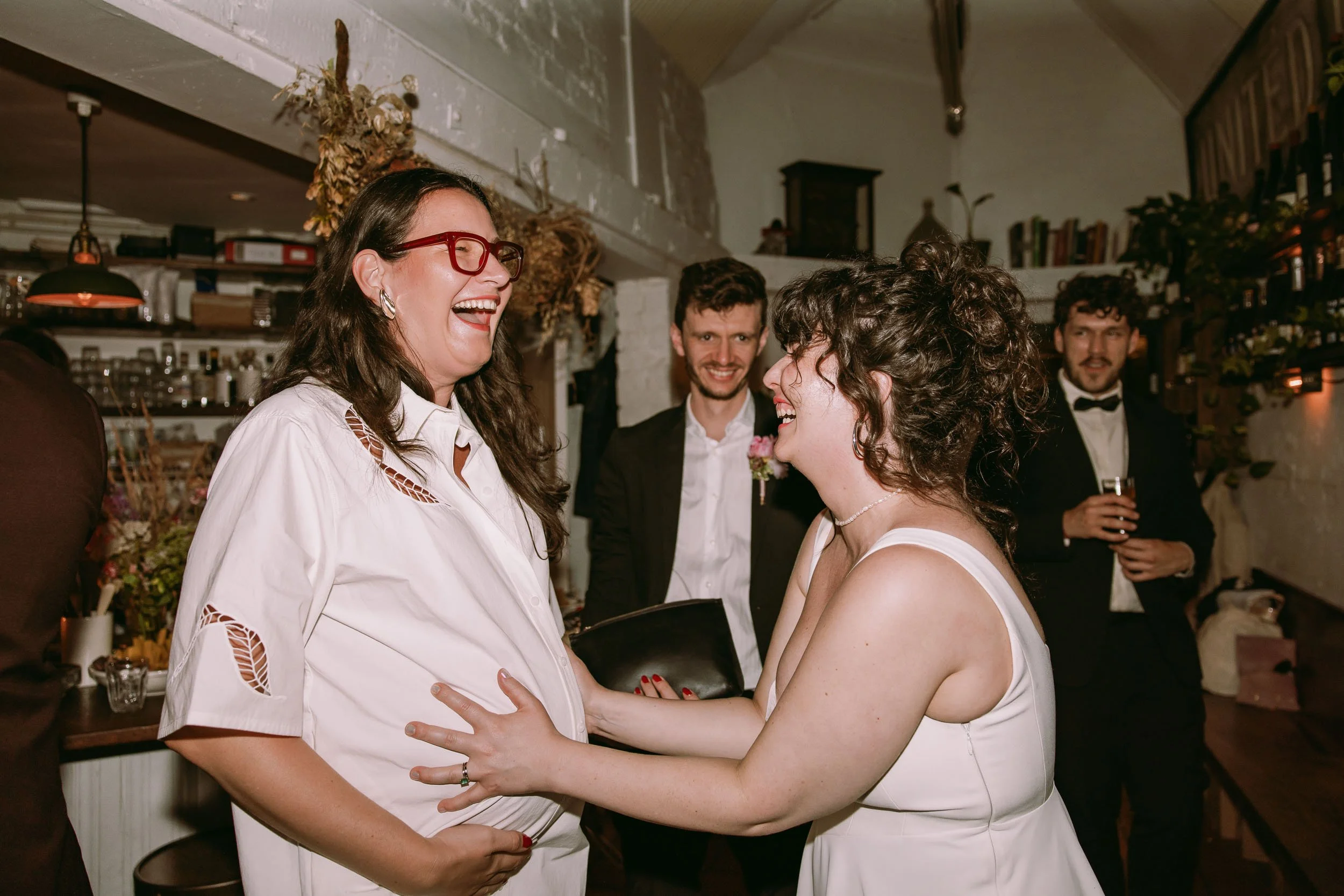 wedding guests enjoying wedding party at bruno wine bar victoria park london