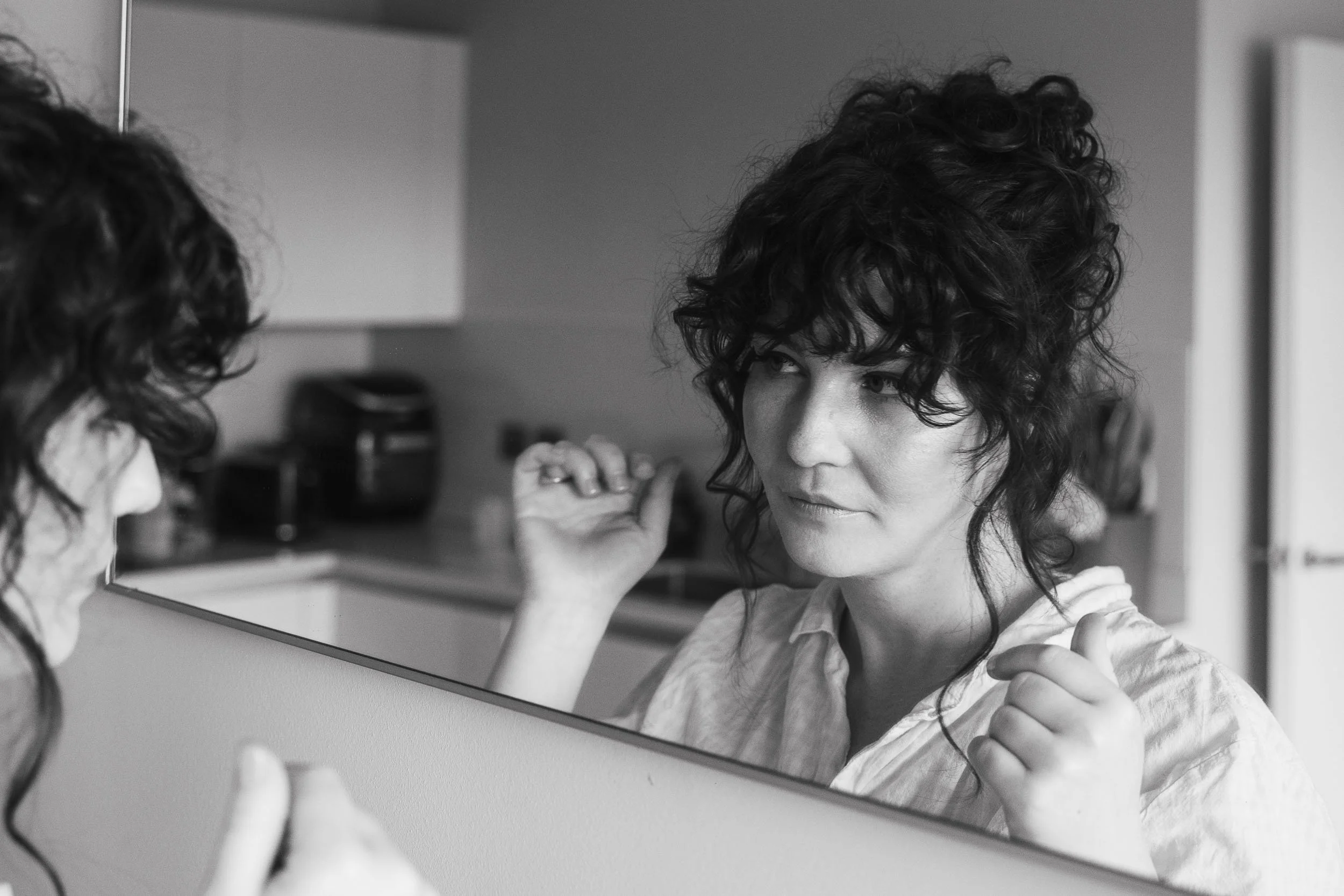 Bride getting ready at home before Hackney Town Hall wedding in London