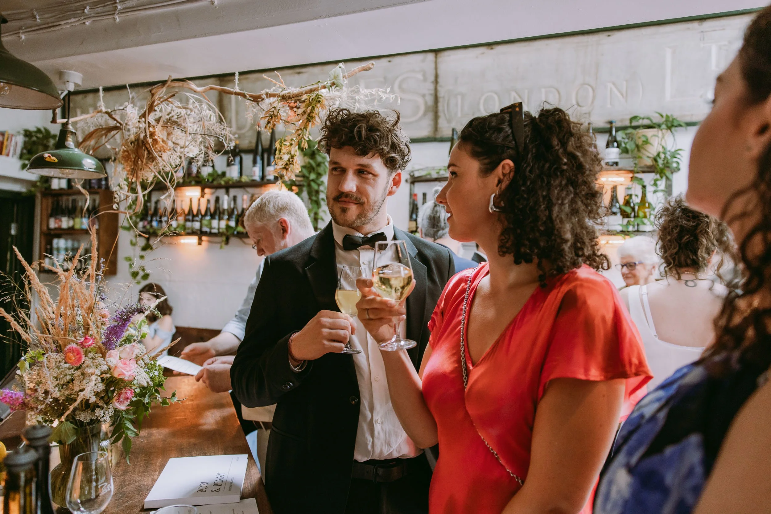 people chatting at wedding reception at bruno wine bar victoria park london