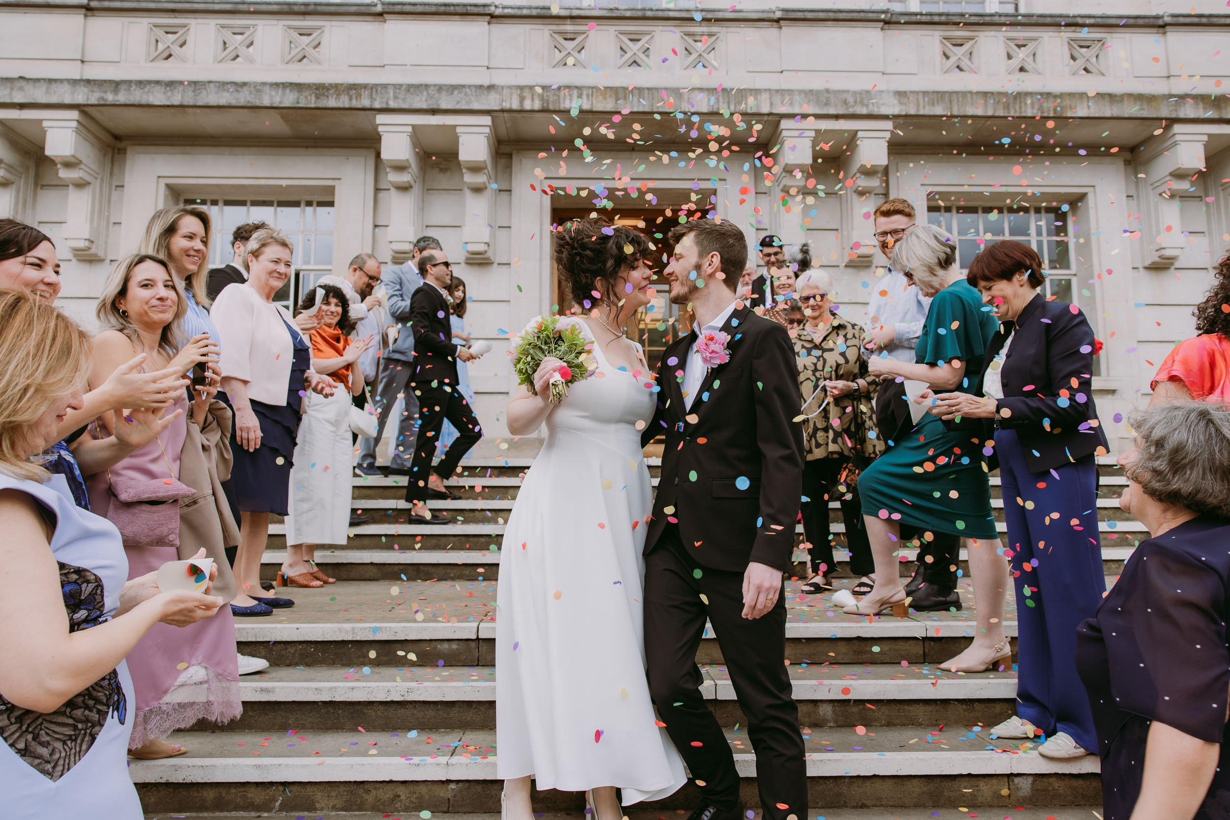 hackney town hall colorful confetti shot by East London wedding Photographer