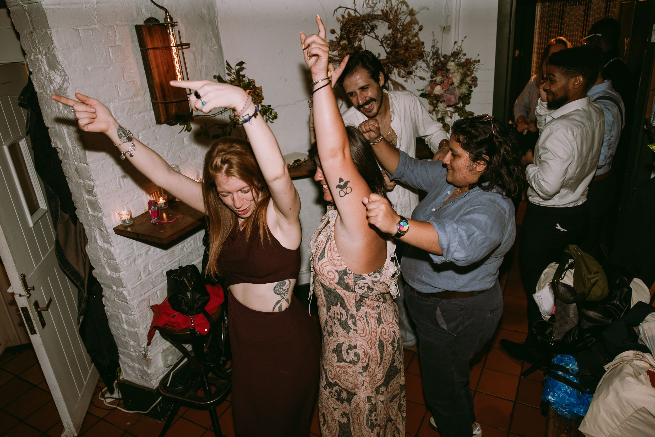 wedding guests enjoying wedding party at bruno wine bar victoria park london