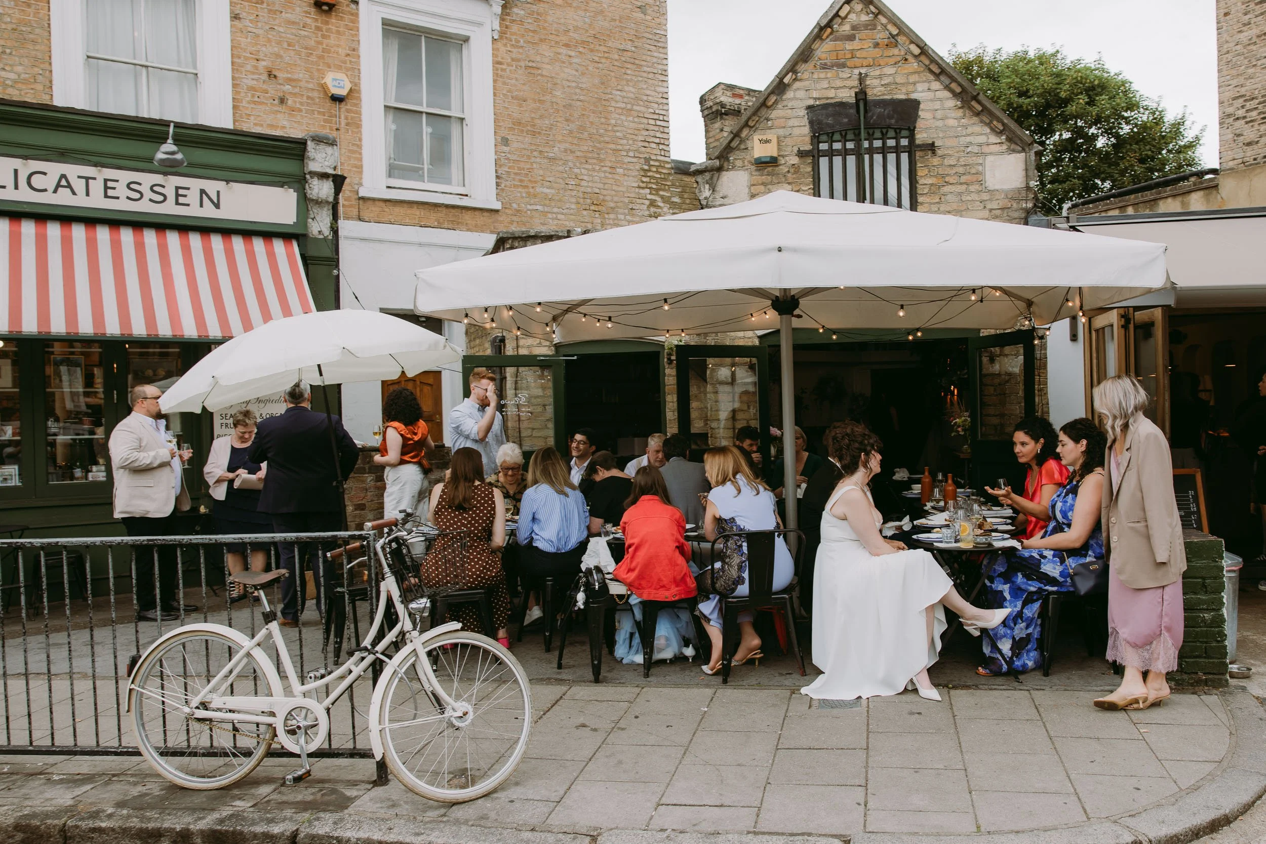 people chatting at wedding reception at bruno wine bar victoria park london