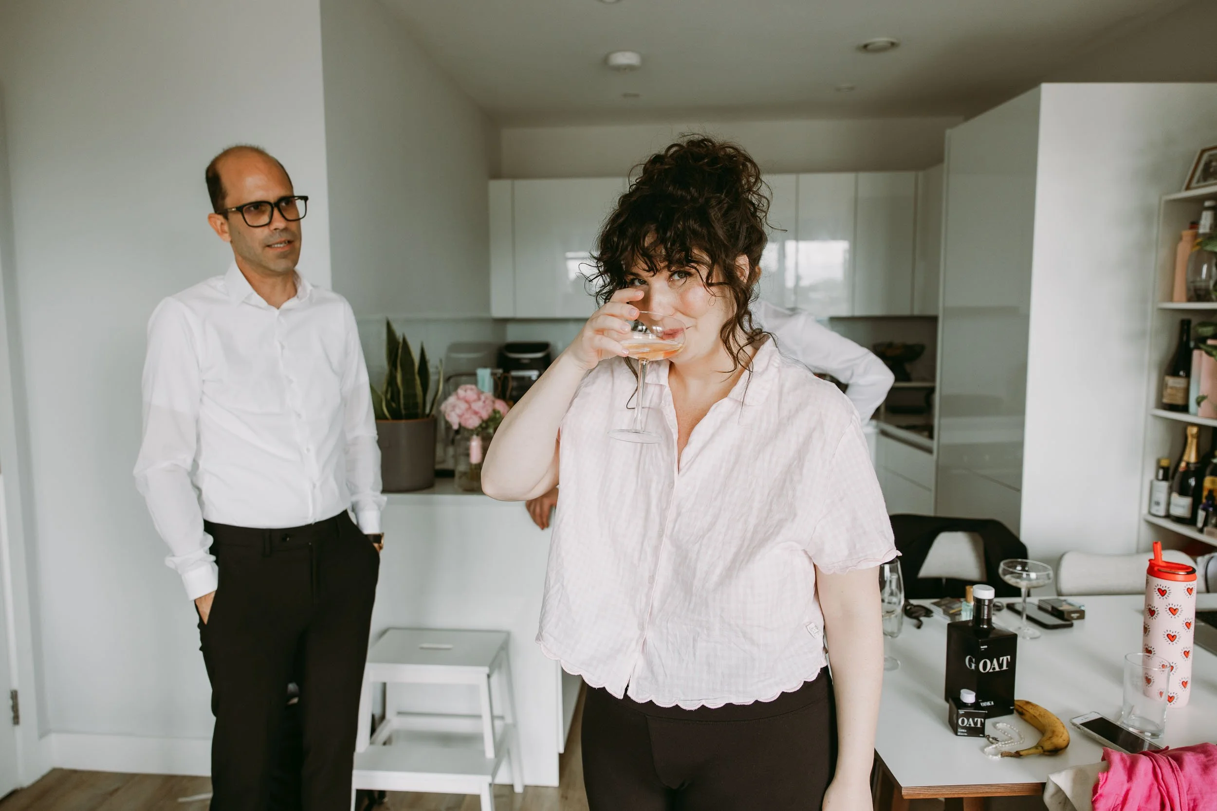 Bride getting ready at home before Hackney Town Hall wedding in London