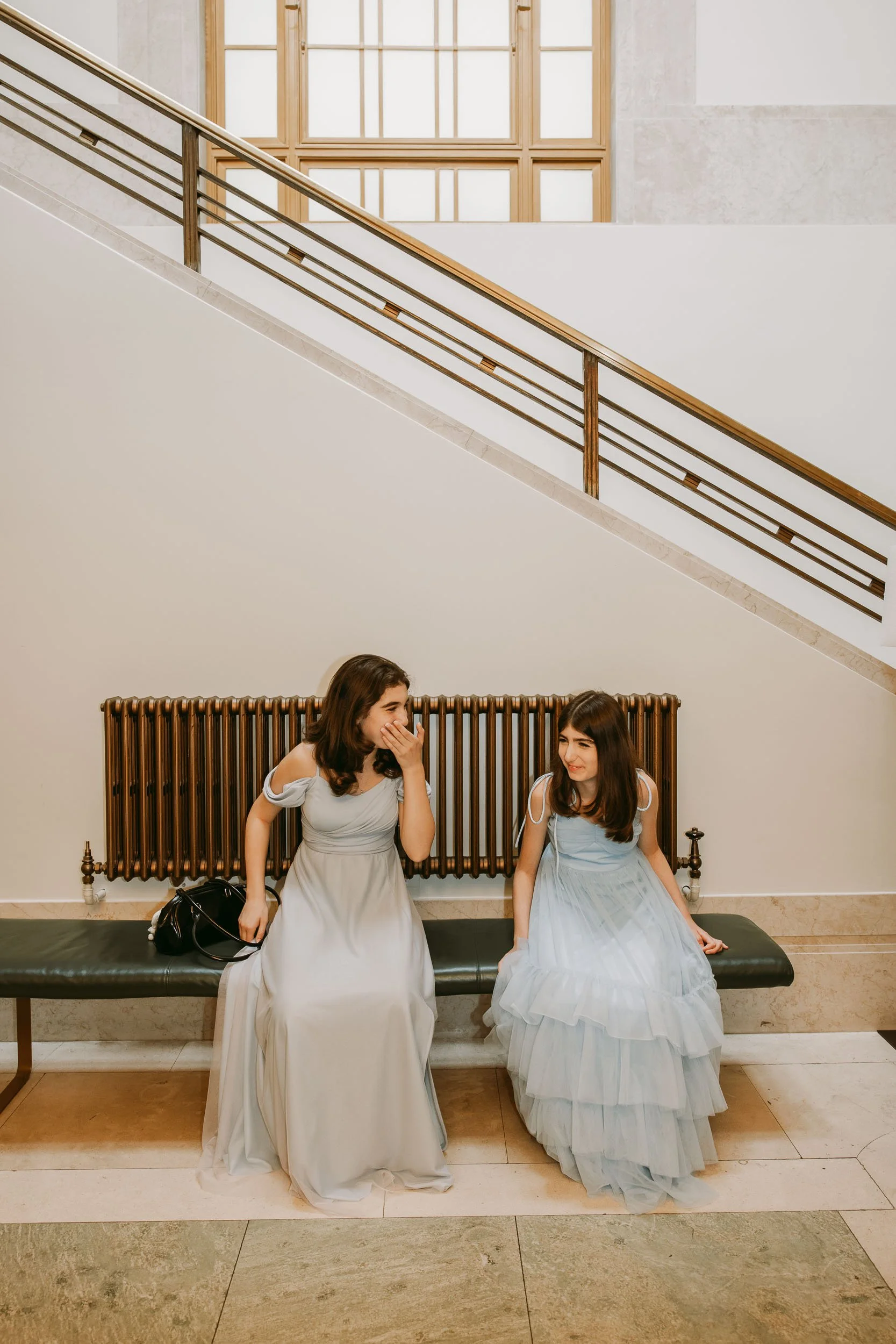 Wedding guests arriving at Hackney Town Hall in London