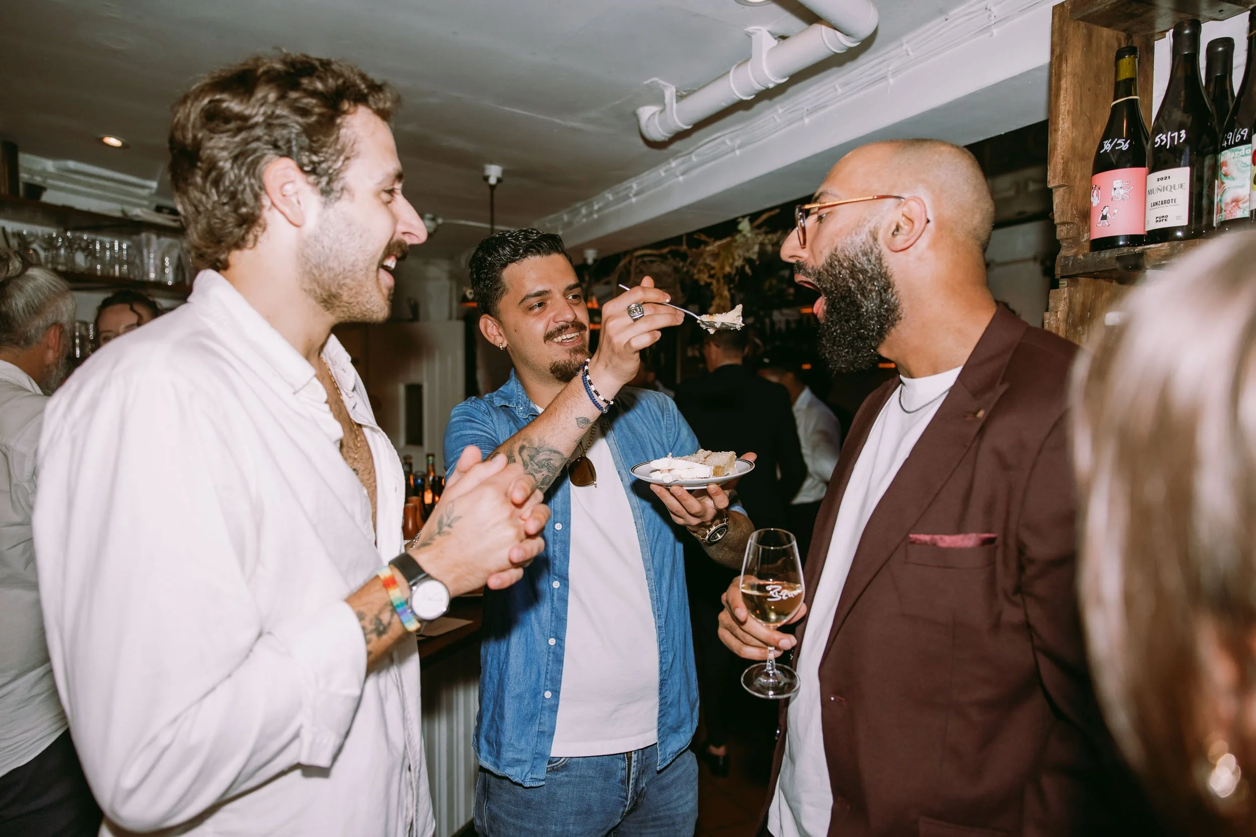 wedding guests enjoying wedding party at bruno wine bar victoria park london