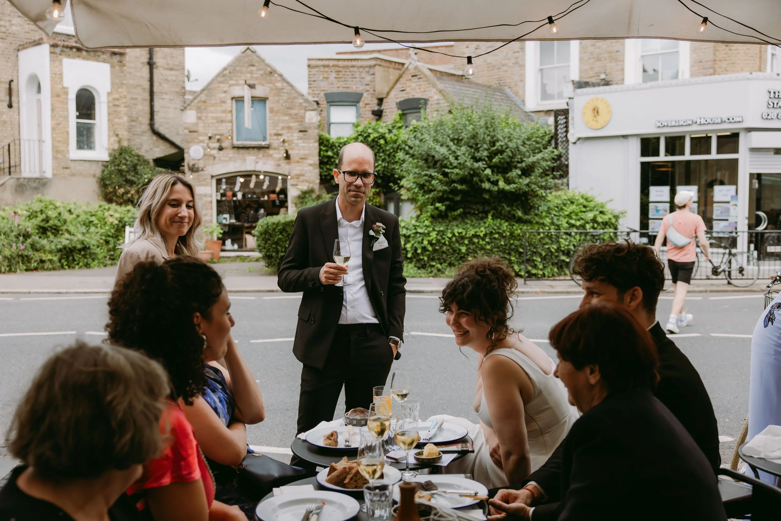wedding guests having fun at wedding reception at bruno wine bar victoria park london