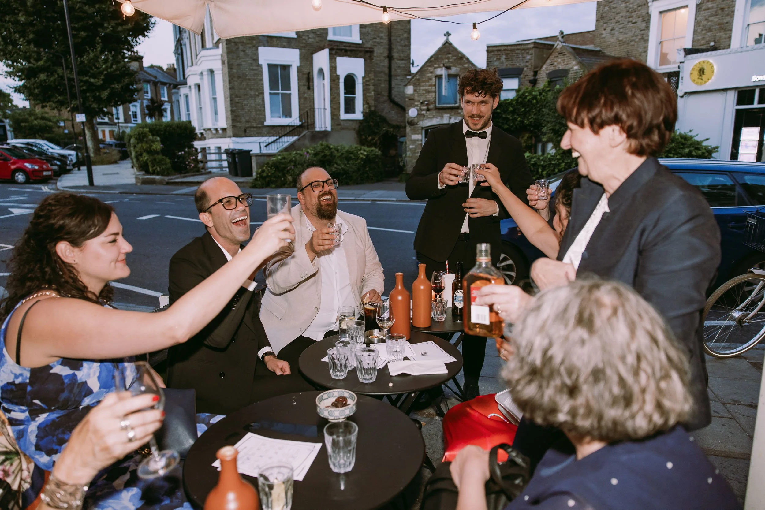 wedding guests enjoying wedding party at bruno wine bar victoria park london