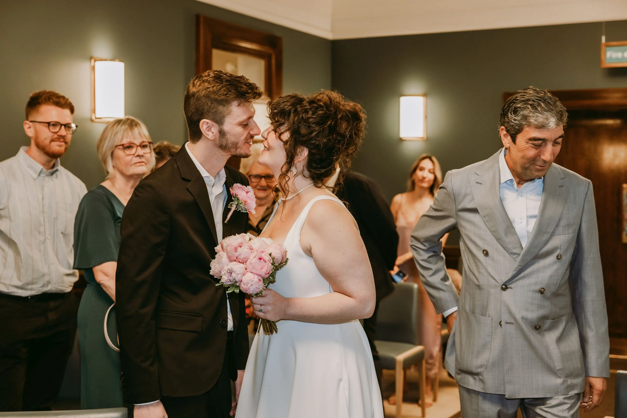 Bride arriving at her wedding ceremony at Hackney Town Hall in London