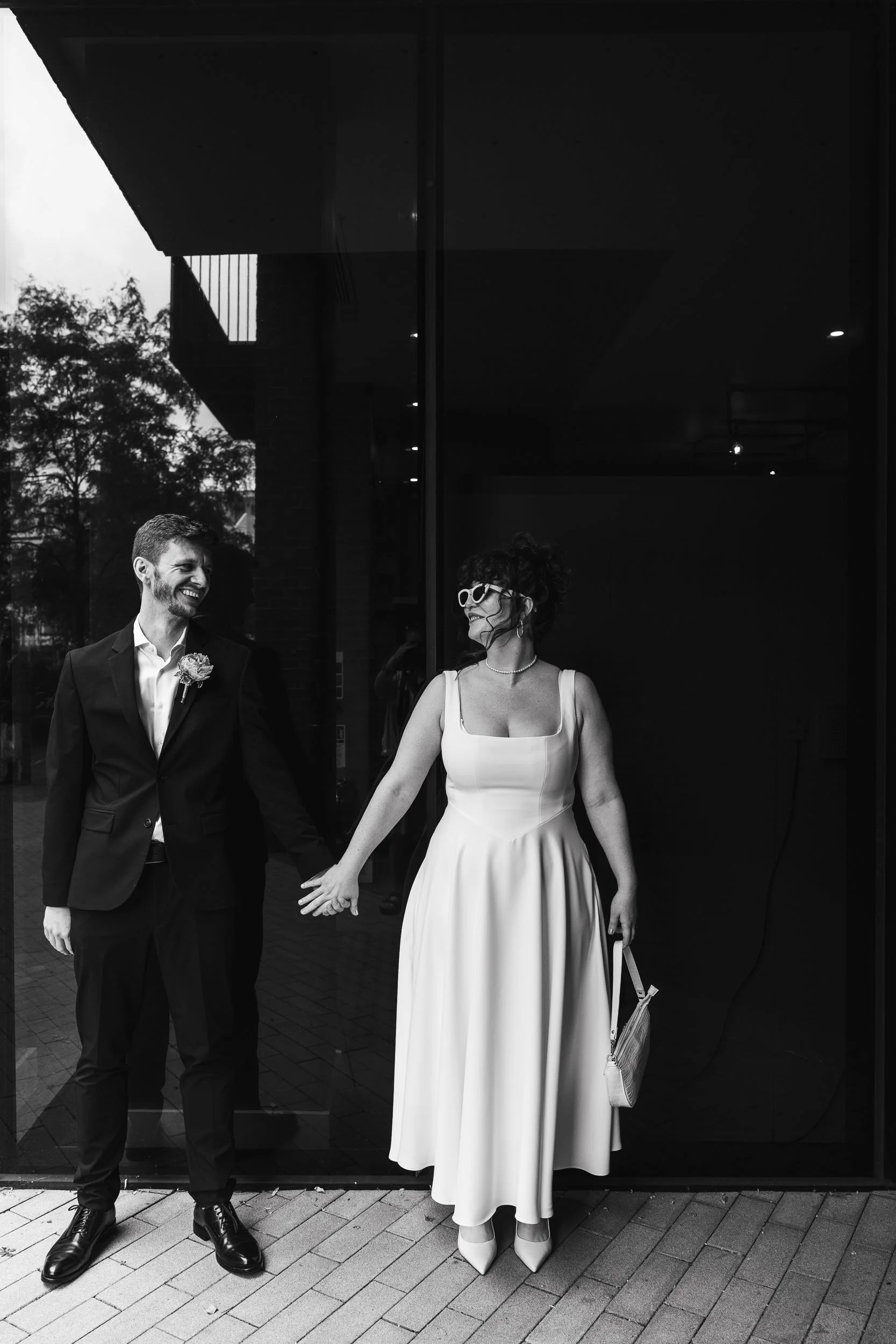 Bride and groom artistic black and white portrait before Hackney Town Hall wedding in London