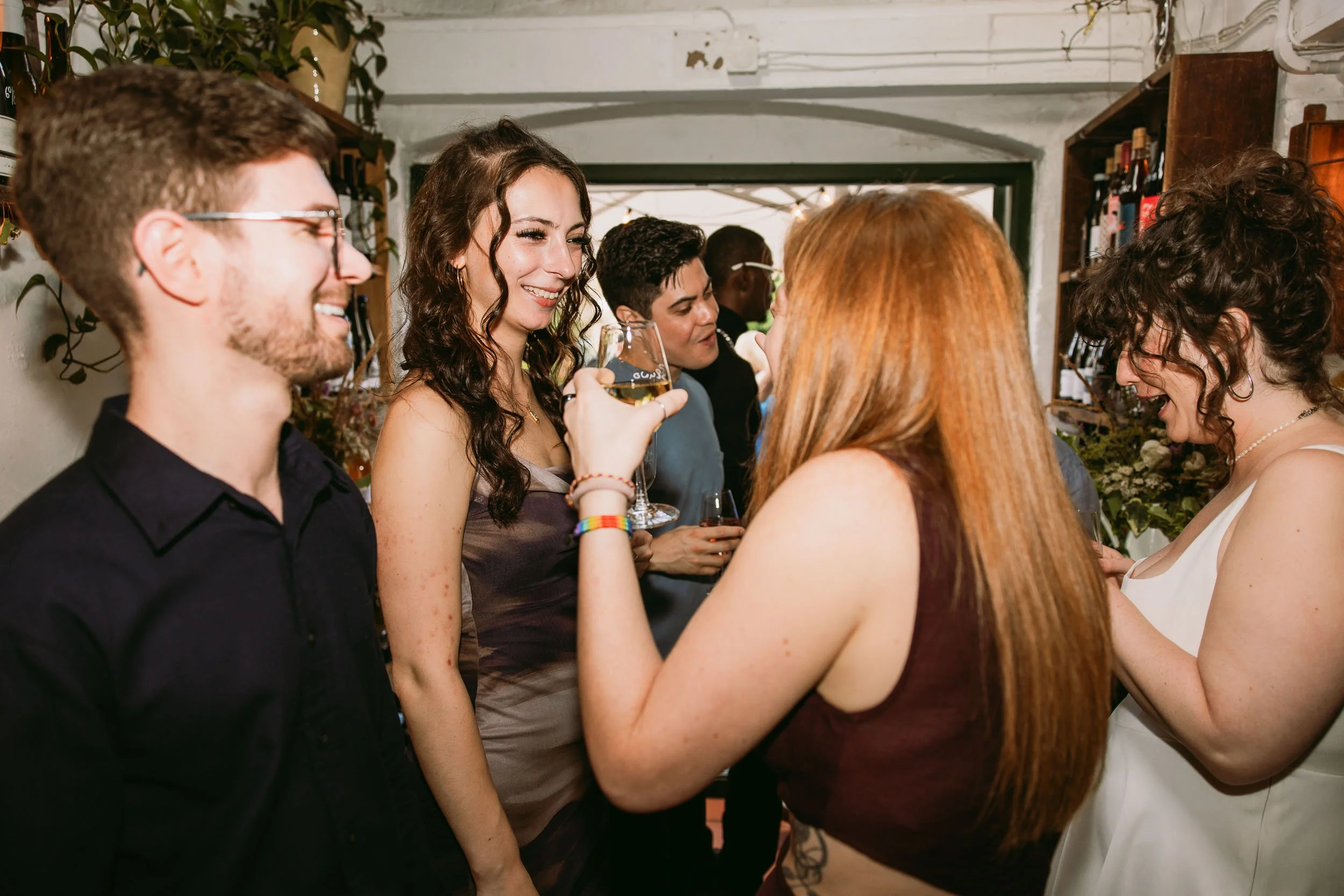 wedding guests enjoying wedding party at bruno wine bar victoria park london