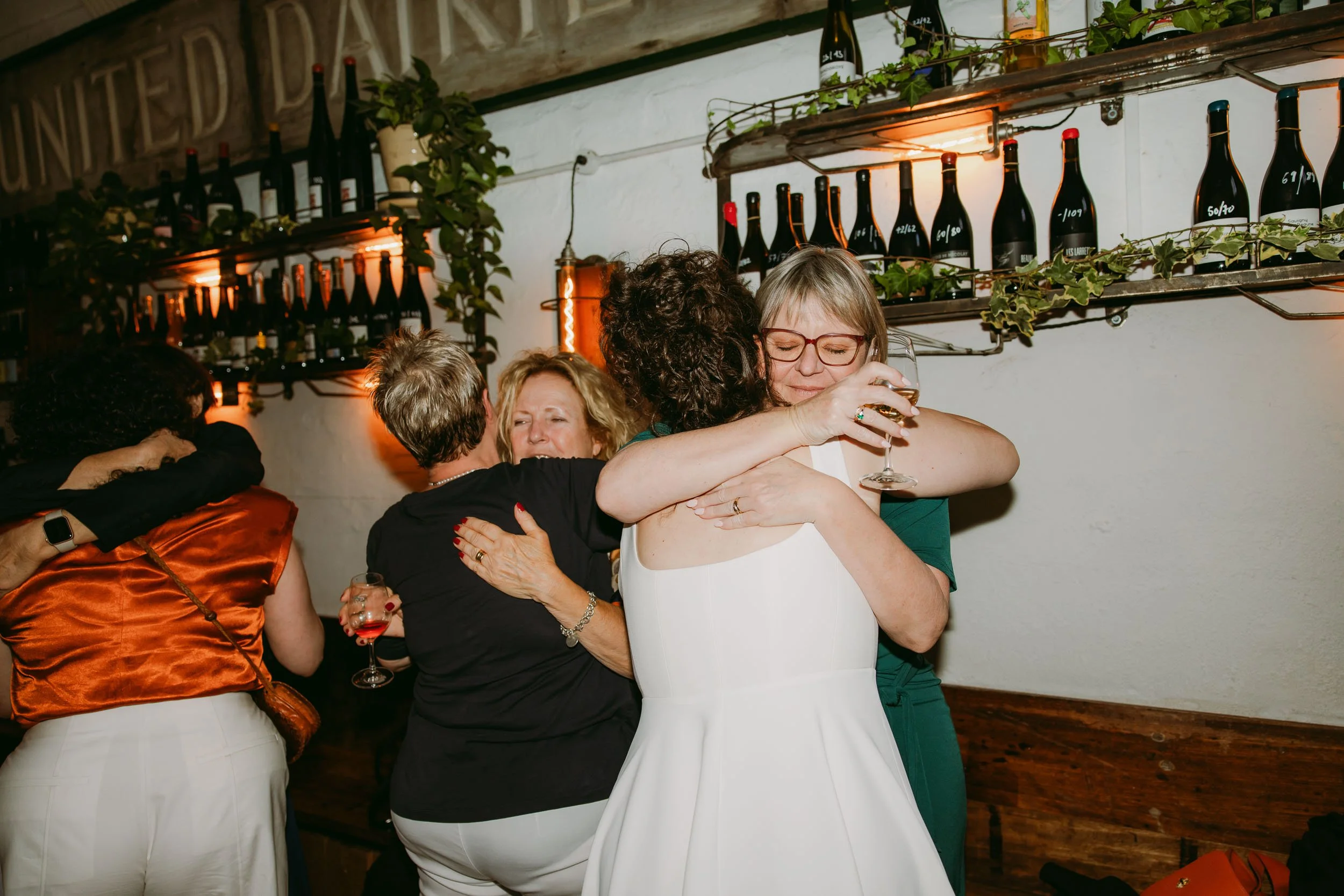 wedding guests enjoying wedding party at bruno wine bar victoria park london