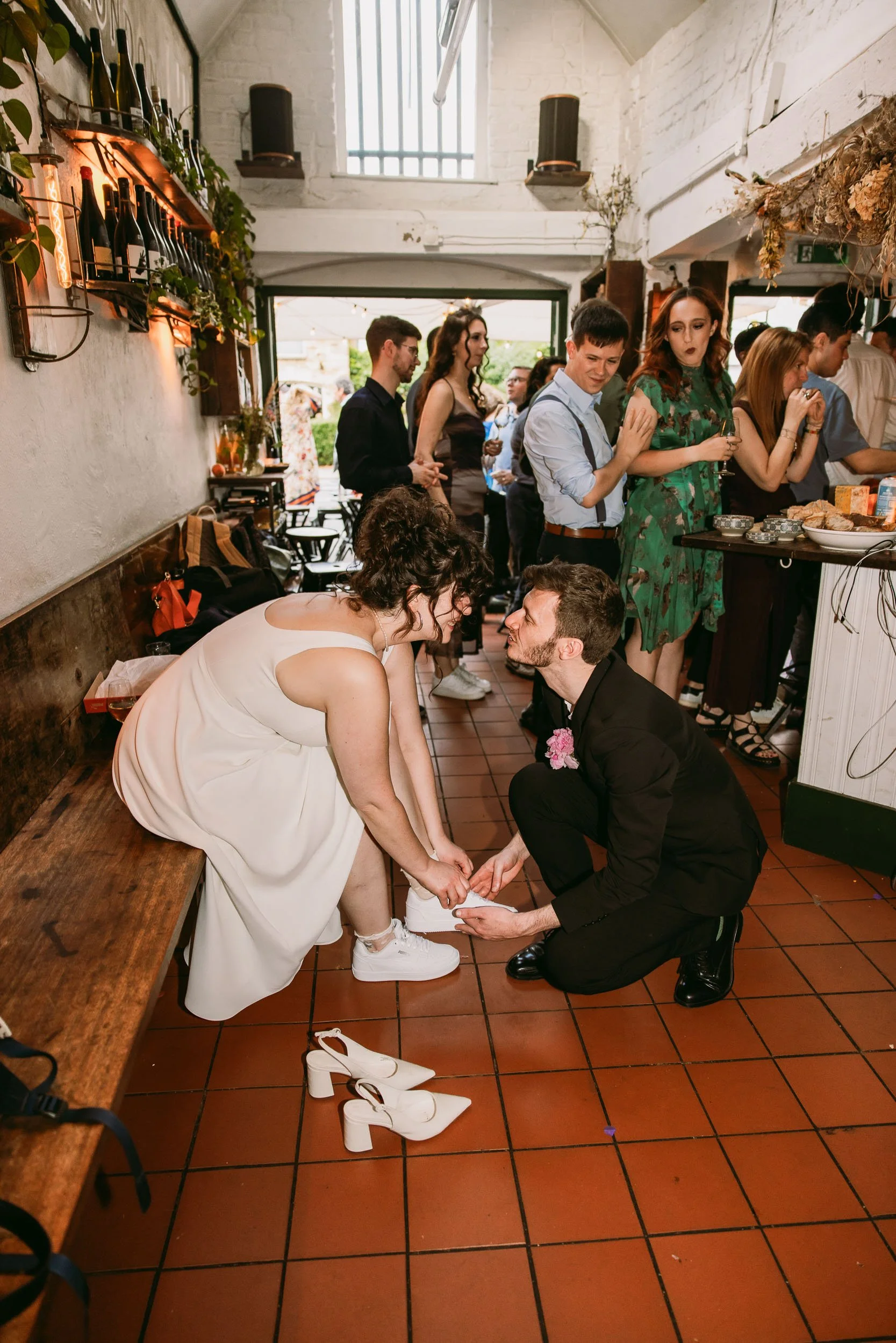 wedding guests enjoying wedding party at bruno wine bar victoria park london