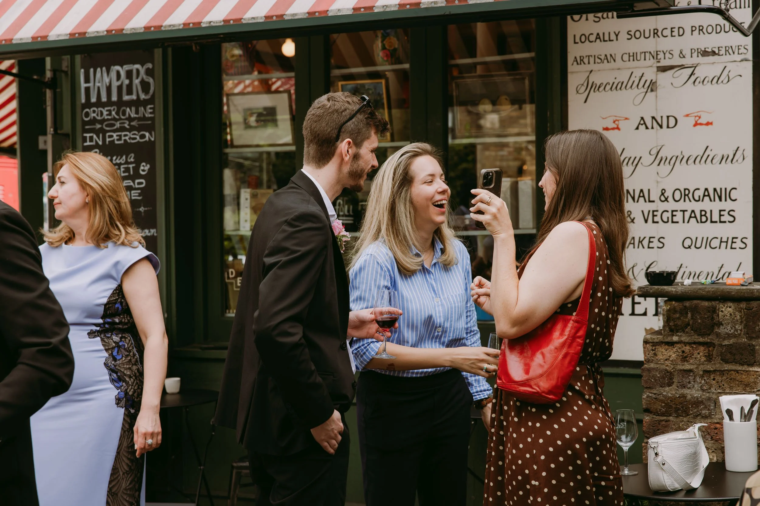 wedding guests having fun at wedding reception at bruno wine bar victoria park london