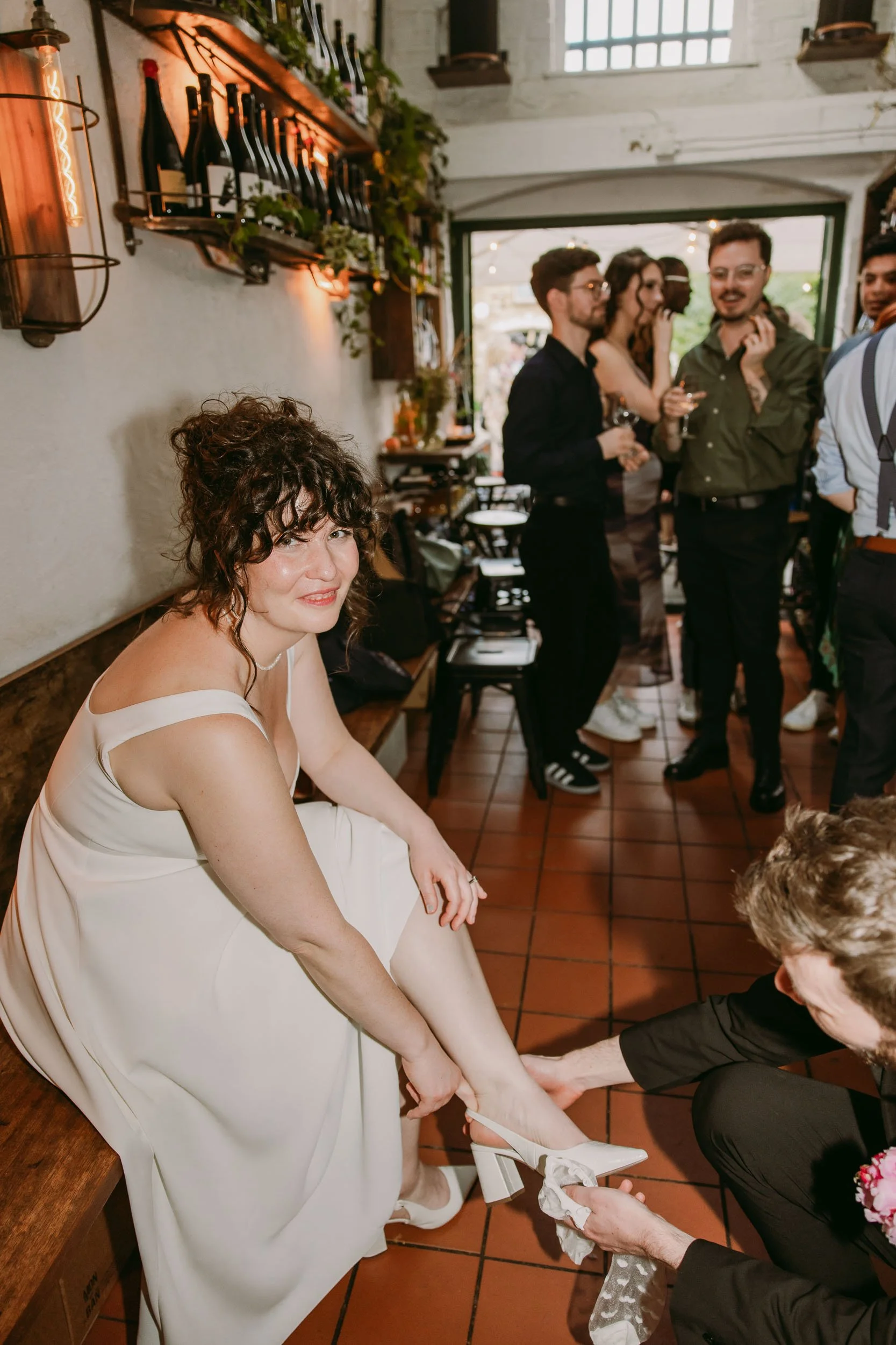 wedding guests enjoying wedding party at bruno wine bar victoria park london