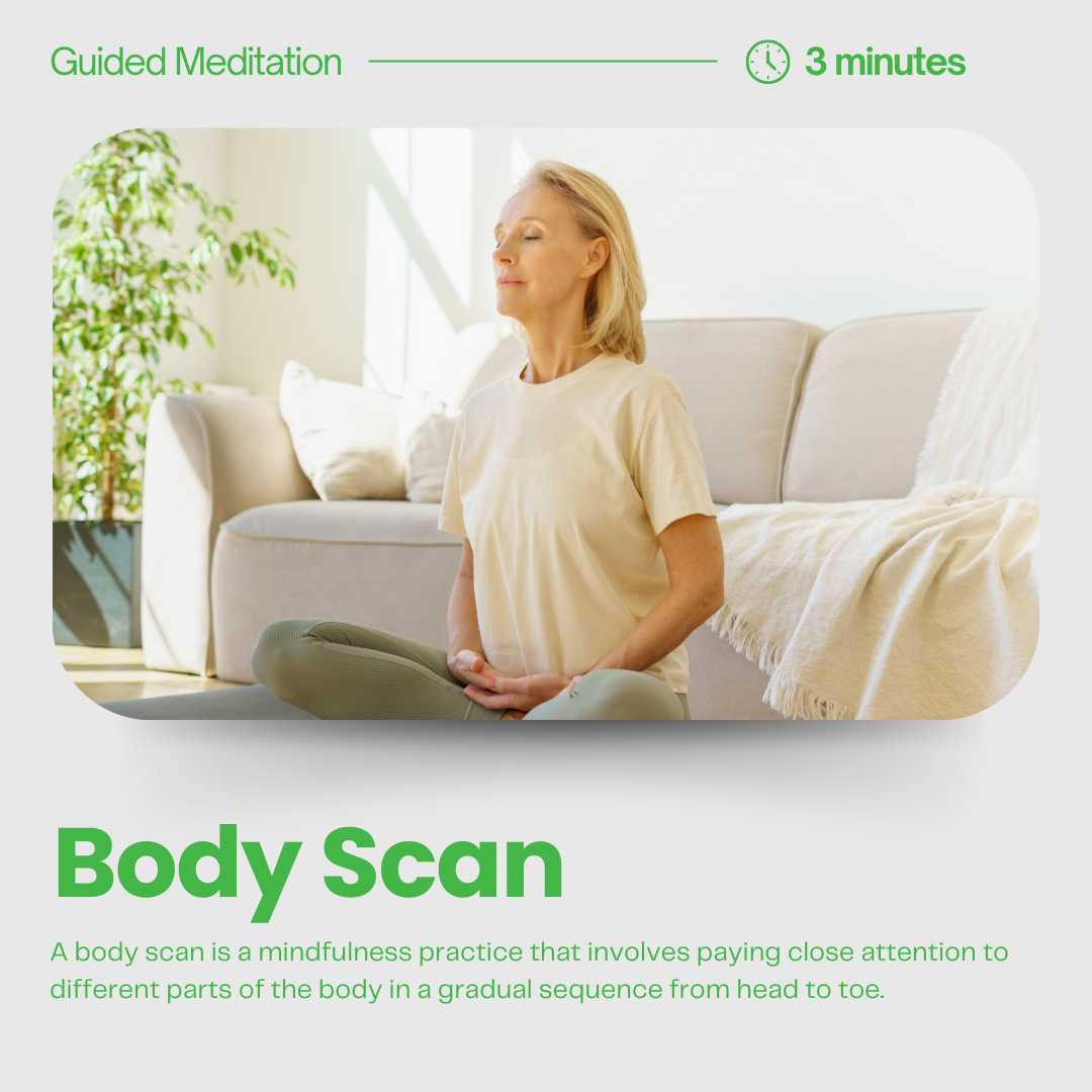An older woman practicing body scan meditation in her living room, sitting cross-legged with eyes closed, sitting on a yoga mat near a beige sofa with pillows and a cream-colored blanket, during daytime with natural light.