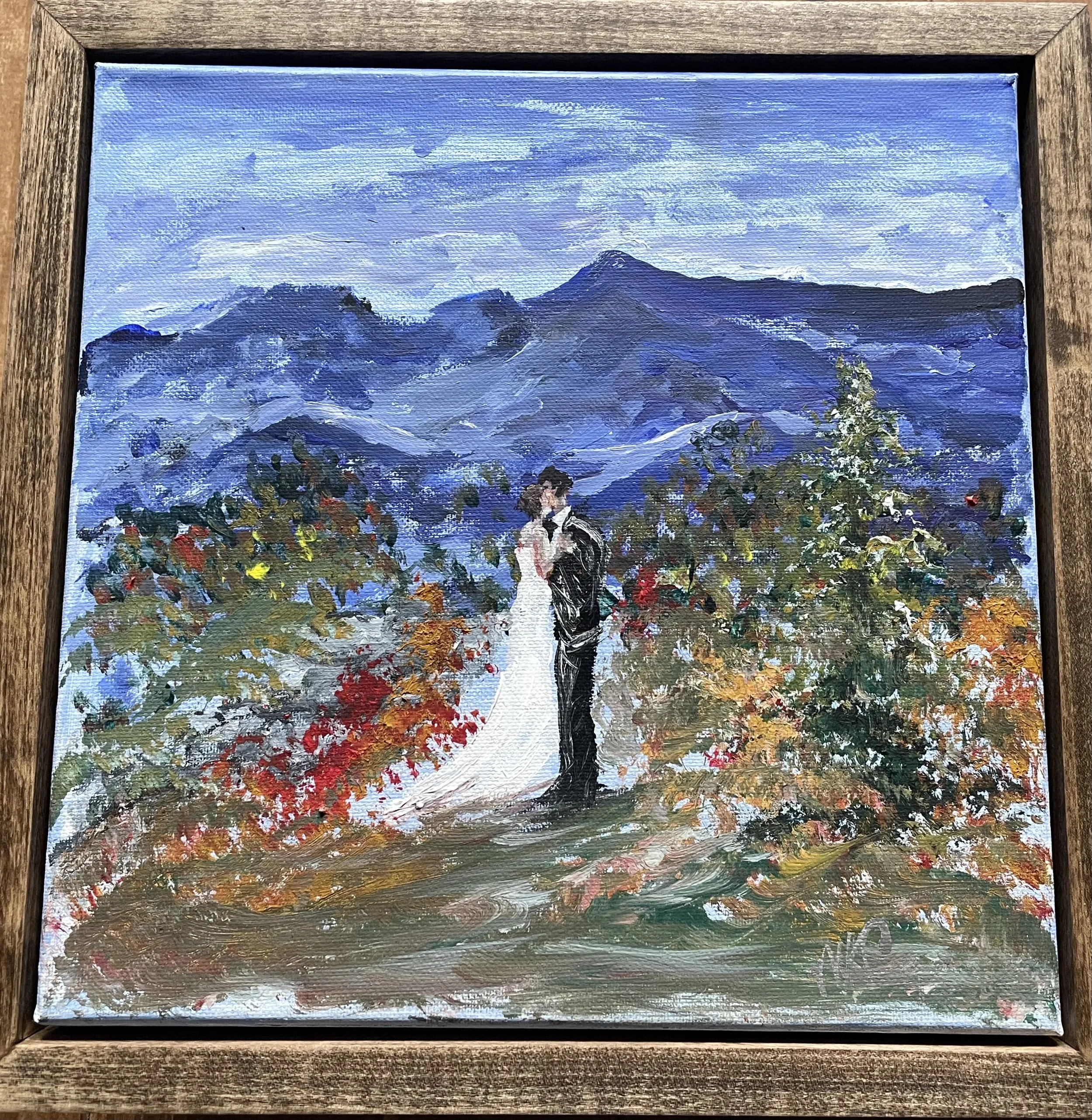 Painting of wedding couple in mountains
