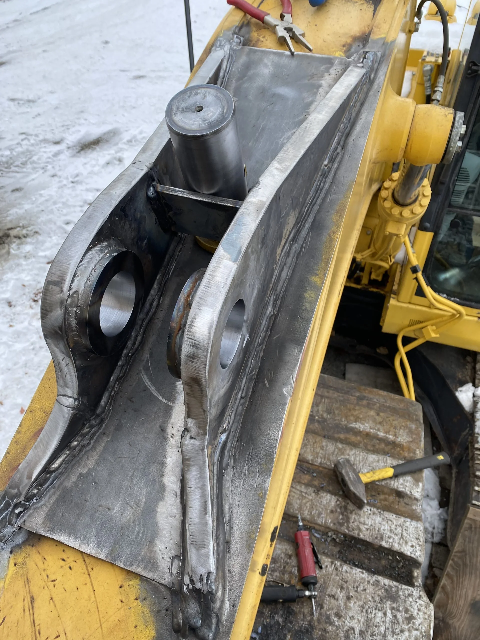 Custom Bracket for Boom Hydraulic Cylinder on a Komatsu PC 138