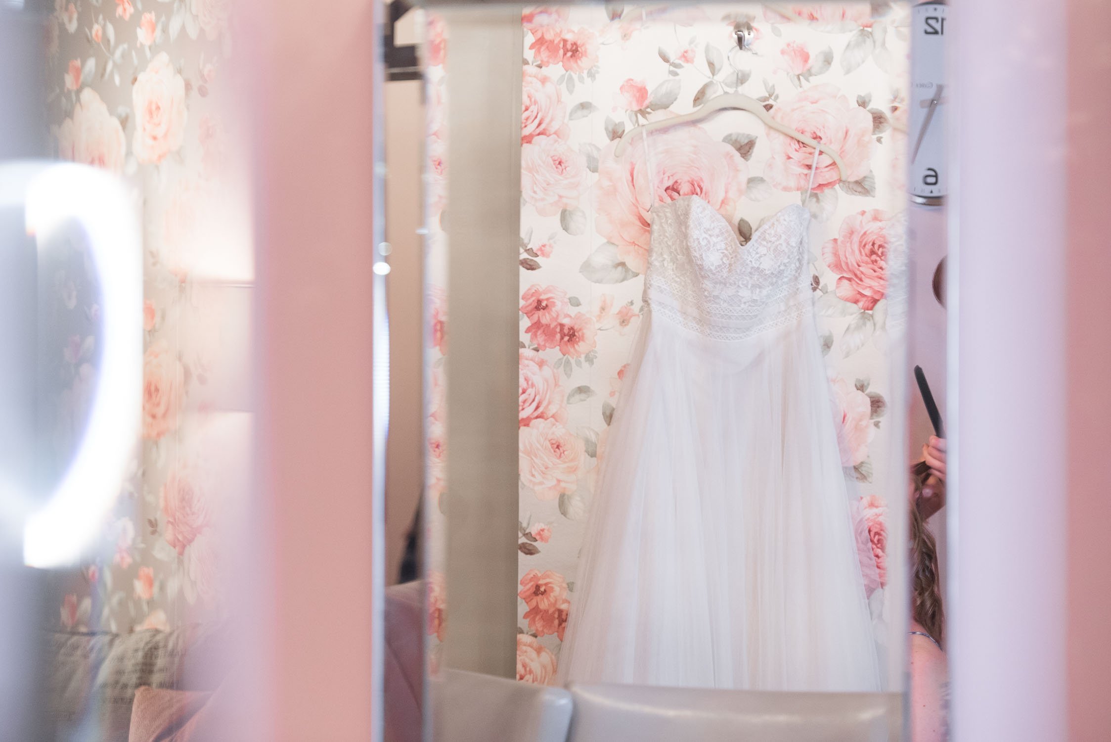 3.+dress+hanging+over+floral+wallpaper.jpg