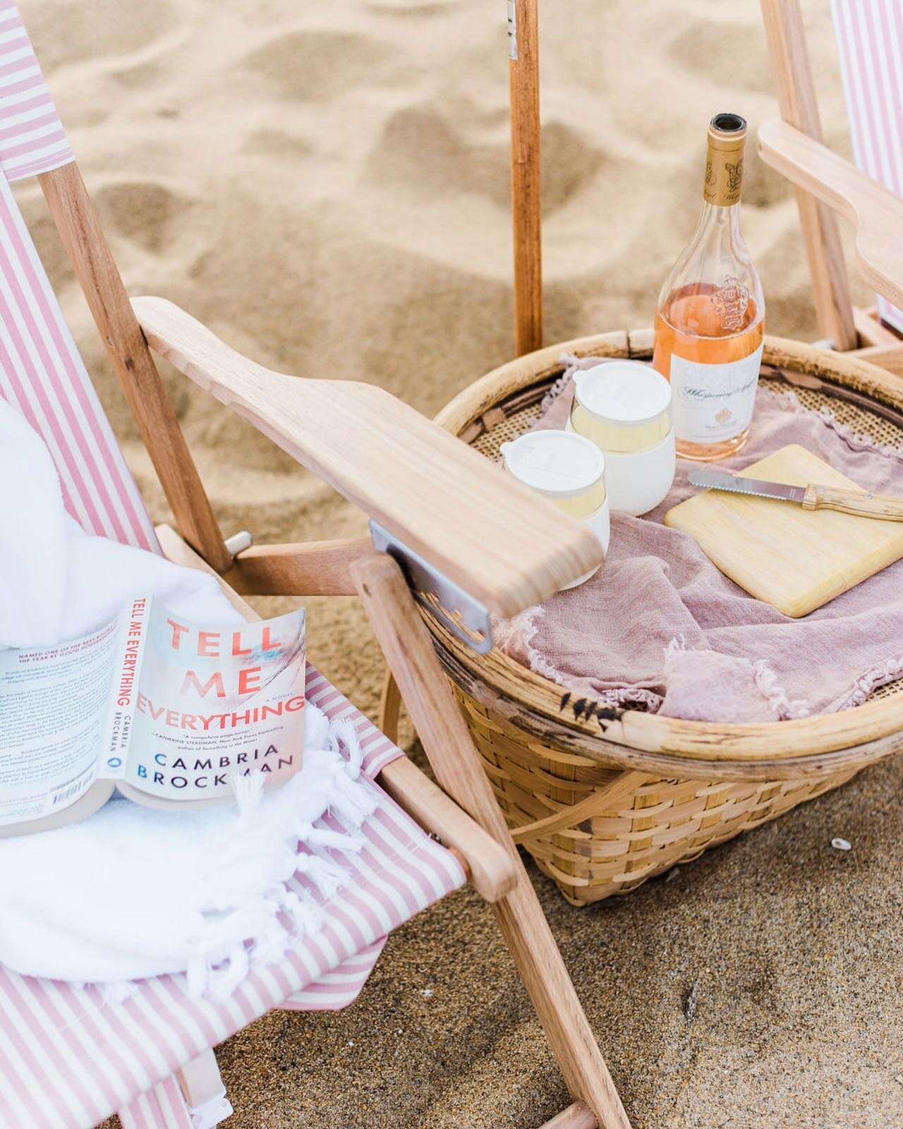 The perfect beach day does exist! Grab a book, a chair, wine, and a snack and hit the sand!  Enjoy!  Photo by @cambria_grace