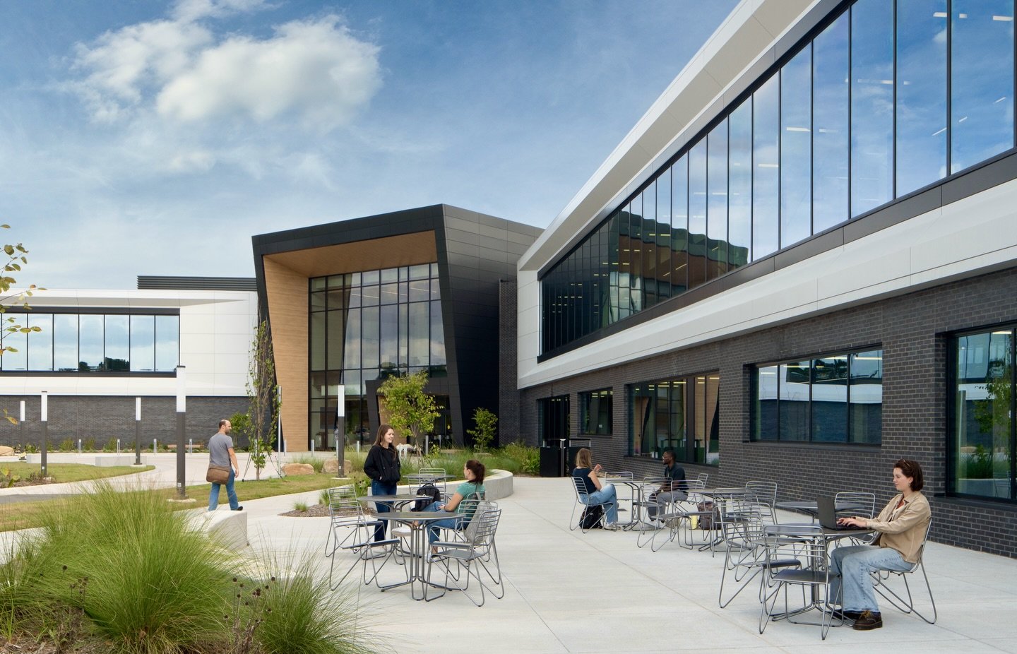 State-of-the-art 67,000-square-foot advanced manufacturing training facility for Johnston Community College.

This project included exterior and interior metal framing, insulation, drywall, finishing, acoustical ceilings, specialty and wood ceilings,