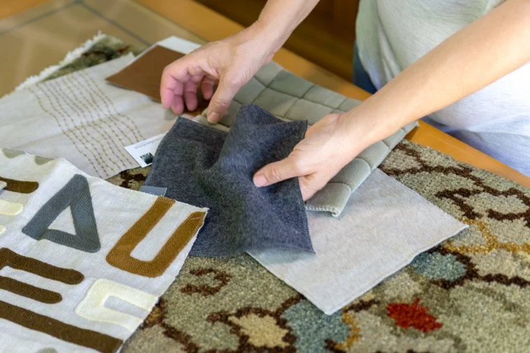 Interior decorator Sher Kovac selecting fabrics
