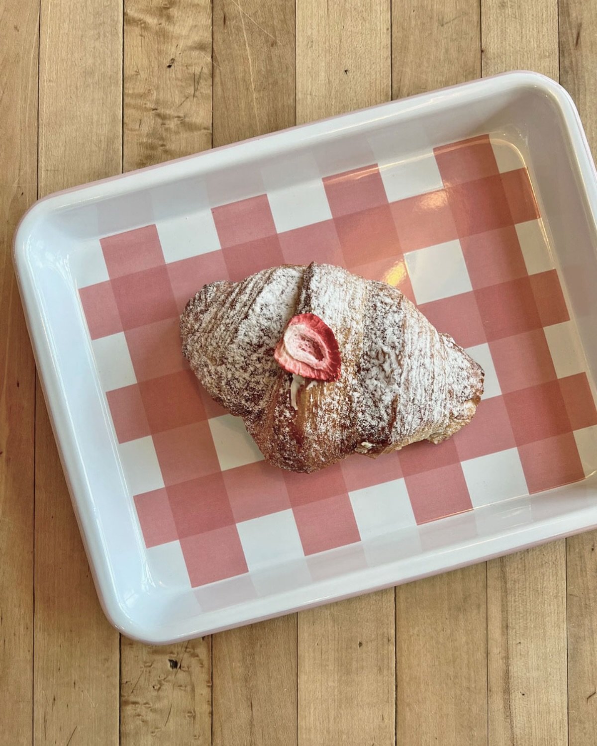 A croissant filled with strawberries &amp; cream cheese 🍓 It&rsquo;s a fan favorite everyday!