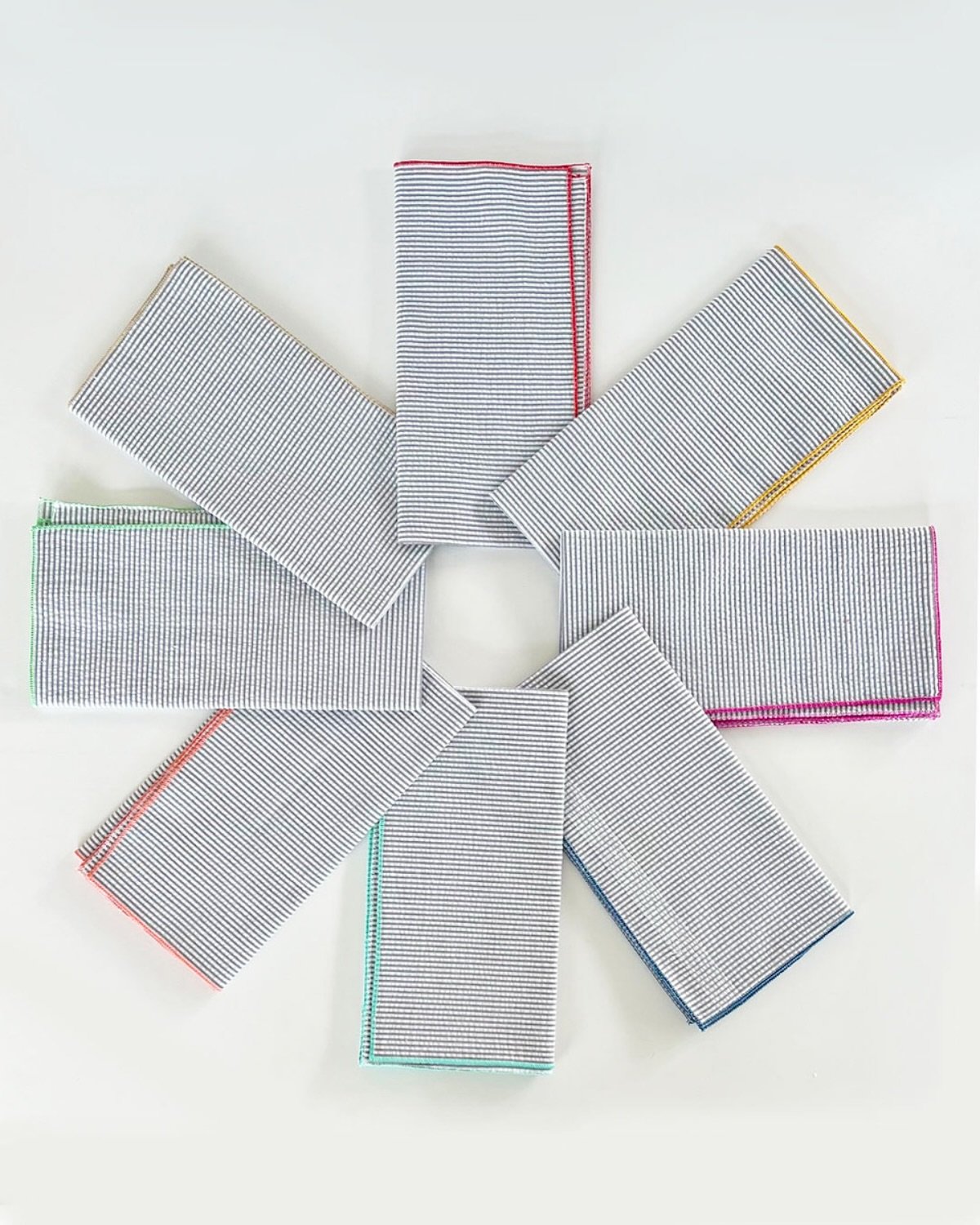 ☆ NEW ☆  Seersucker napkins with colorful trim. Made for sunny days and outdoor dining - See up close details in our stories today!