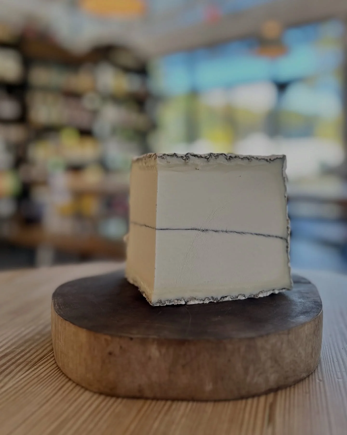 Named for the fog which rolls in from Humbolt Bay, this goat milk cheese is creamy &amp; light with a layer of edible white ash in the center. 
Humbolt Fog - As pretty as it is delicious!