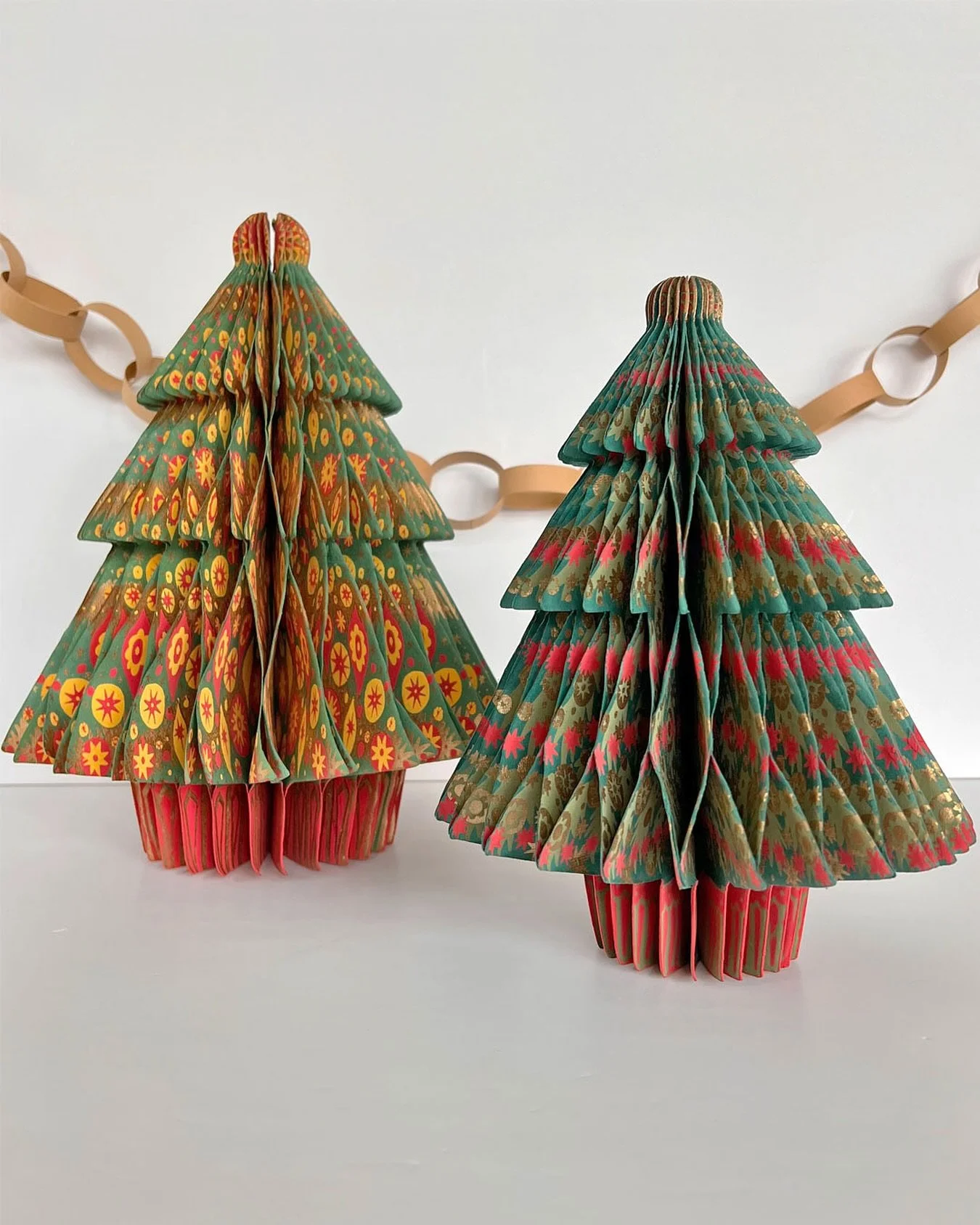 Printed paper trees decorate the market - our holiday shop is ready for you to enjoy!