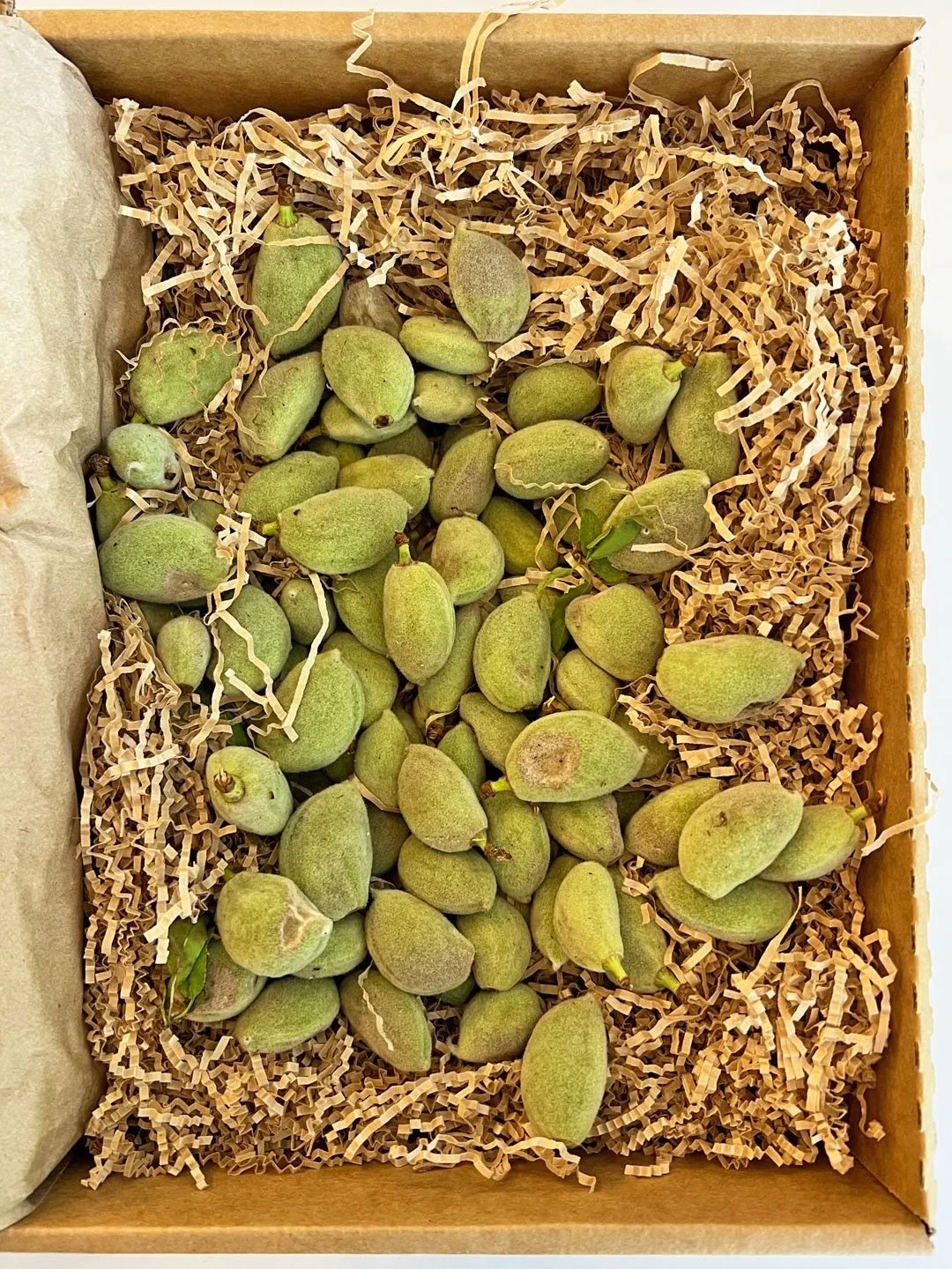 A delivery of green almonds leads to a new cheese course in Bacchanalia - Pickled in Verjus and paired with Fromage Blanc, green garlic &amp; almond crumbles