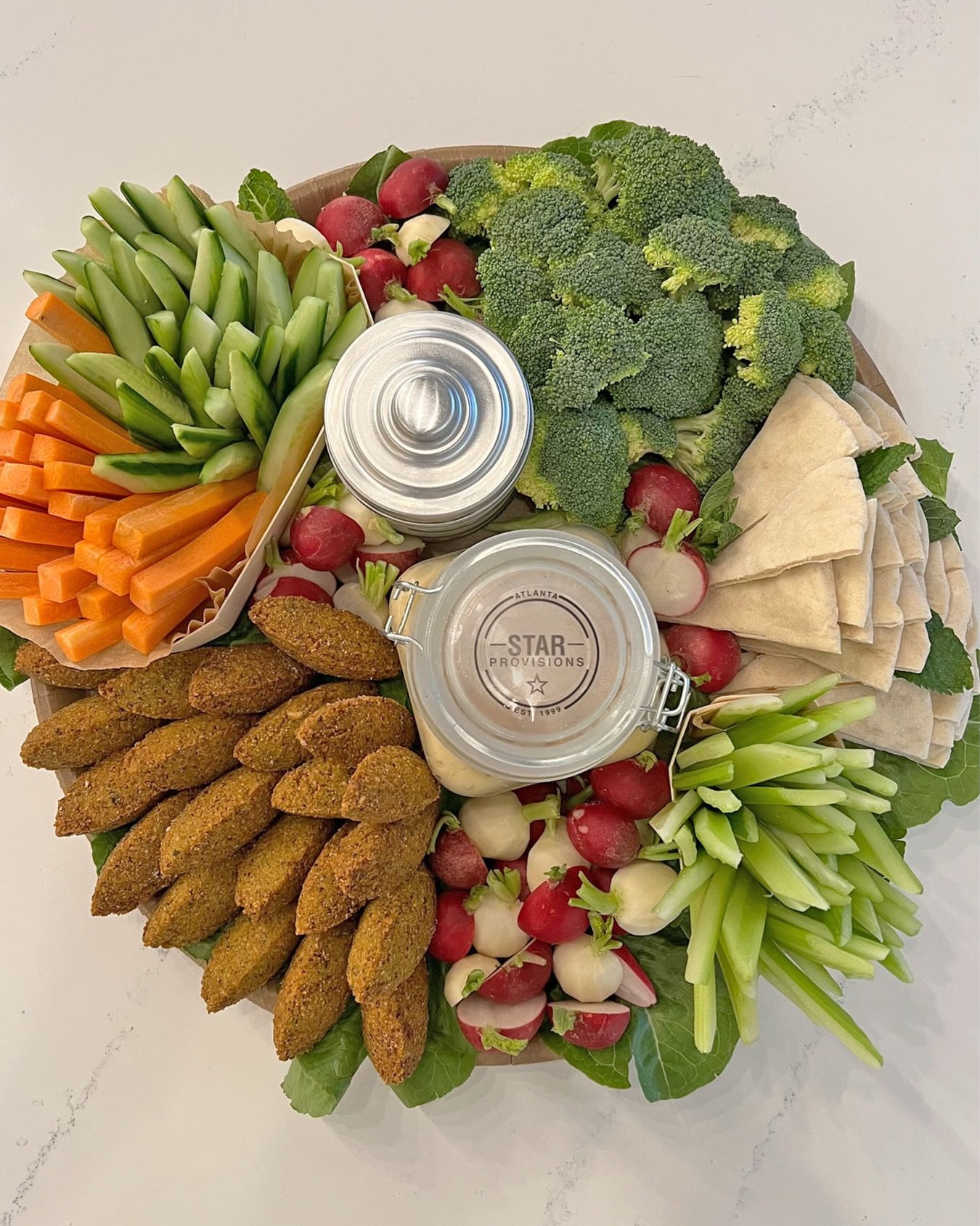 Have an office event coming up?.. Star Provisions catering trays can help! 
Lunch favorites, like our falafel plate, scaled up to serve the whole crew. 

Call or come by the market and speak with Carol for specifics.