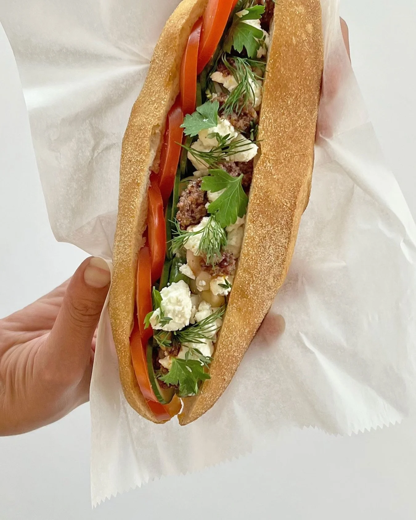 Come see us at @freedomfarmersmkt today and try our veggie sandwich!.. 
Sliced tomato &amp; cucumbers, topped with a three bean salad, vinaigrette, olive tapenade, feta crumbles and fresh herbs &mdash; delicious!