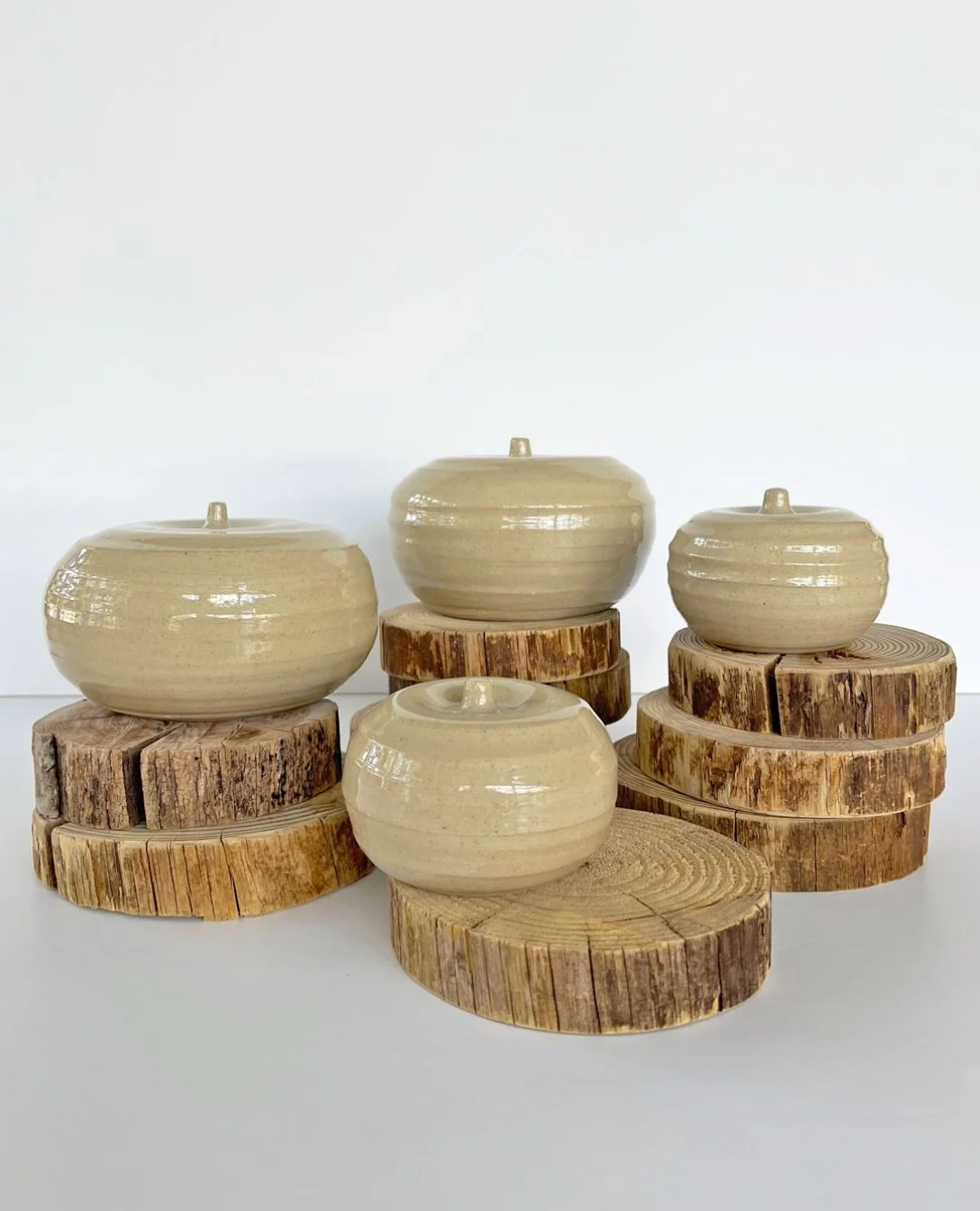 A collection of @farmhousepottery pumpkins, ready to dress up your seasonal table!