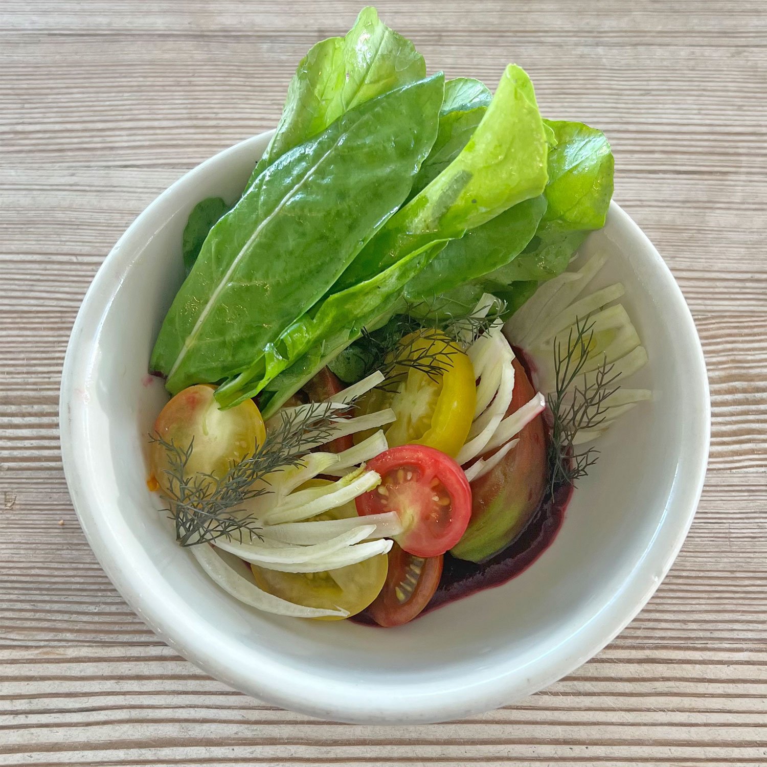 SIDE: Heirloom Tomato, Arugula, Beet Puree, Shaved Fennel, Olive Oil