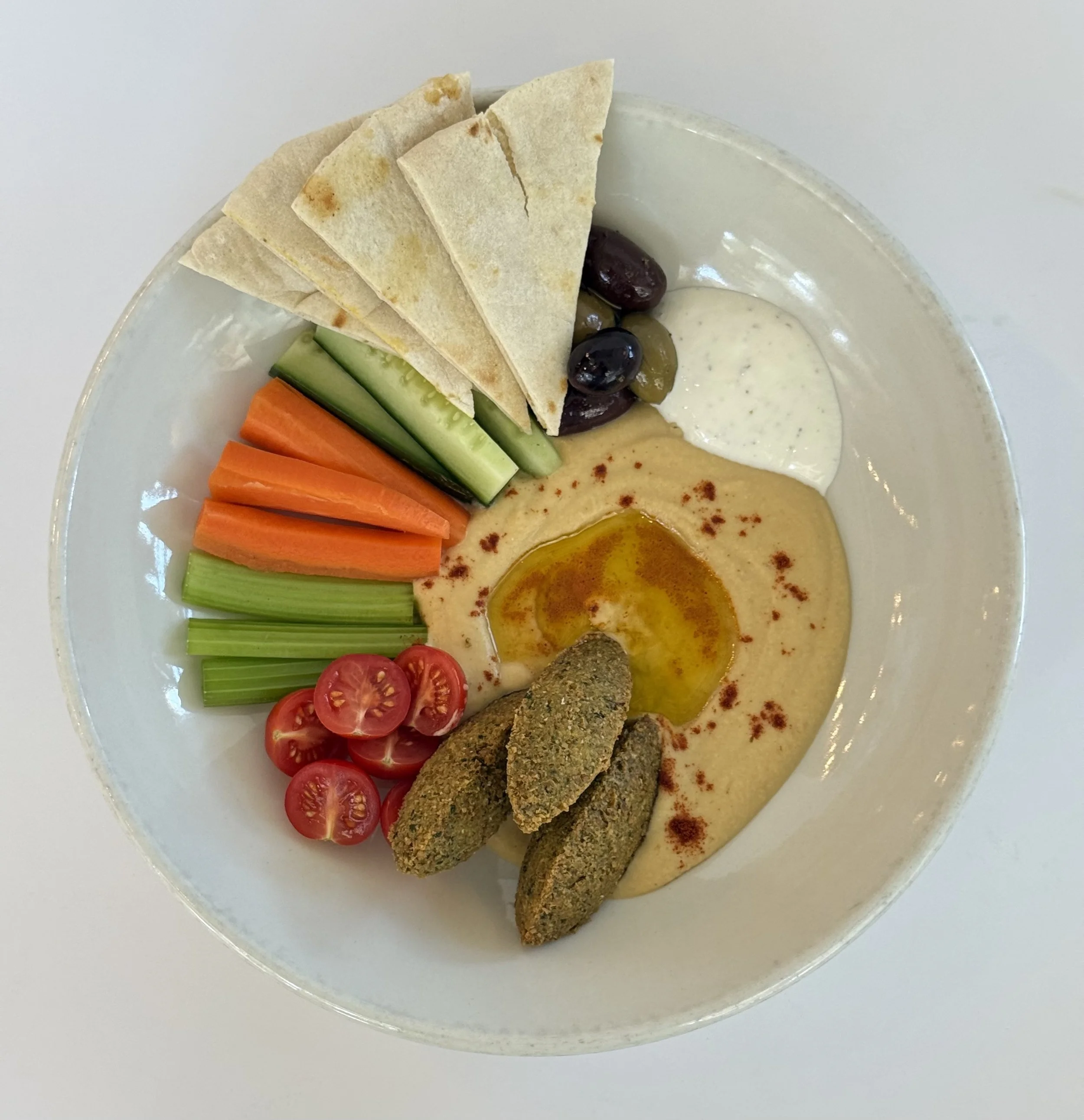 BOARDS + BOWLS - Falafel Plate with Hummus, Cucumber, Tomato, Yogurt, Tahini, Olives and Pita