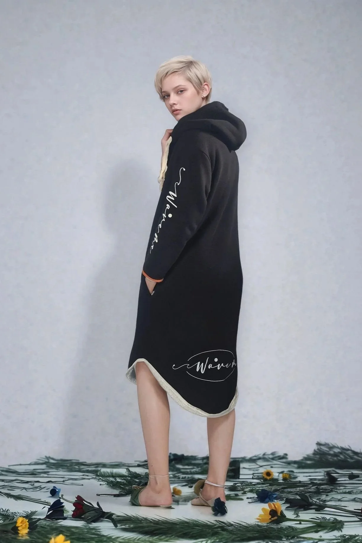Studio Model modelling the WaveMe StayDri Long Hoody in Black