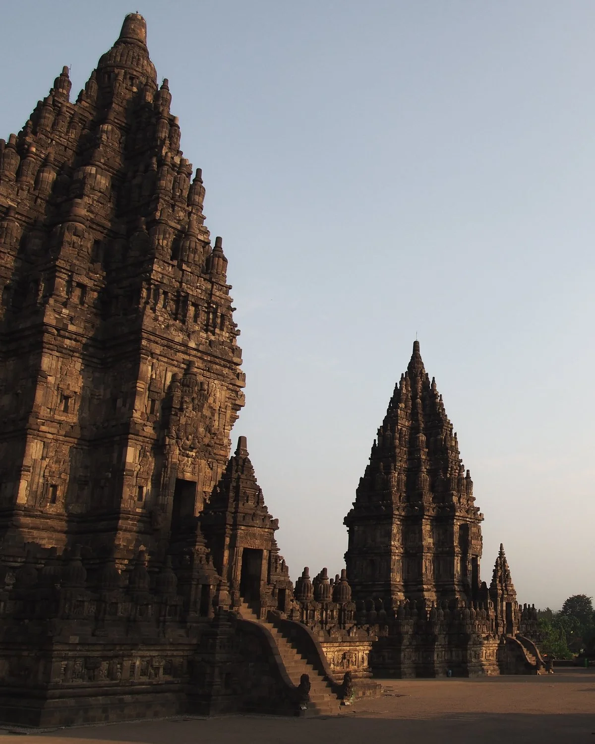 Early morning at Prambanan Temple lit up by first sun rays.