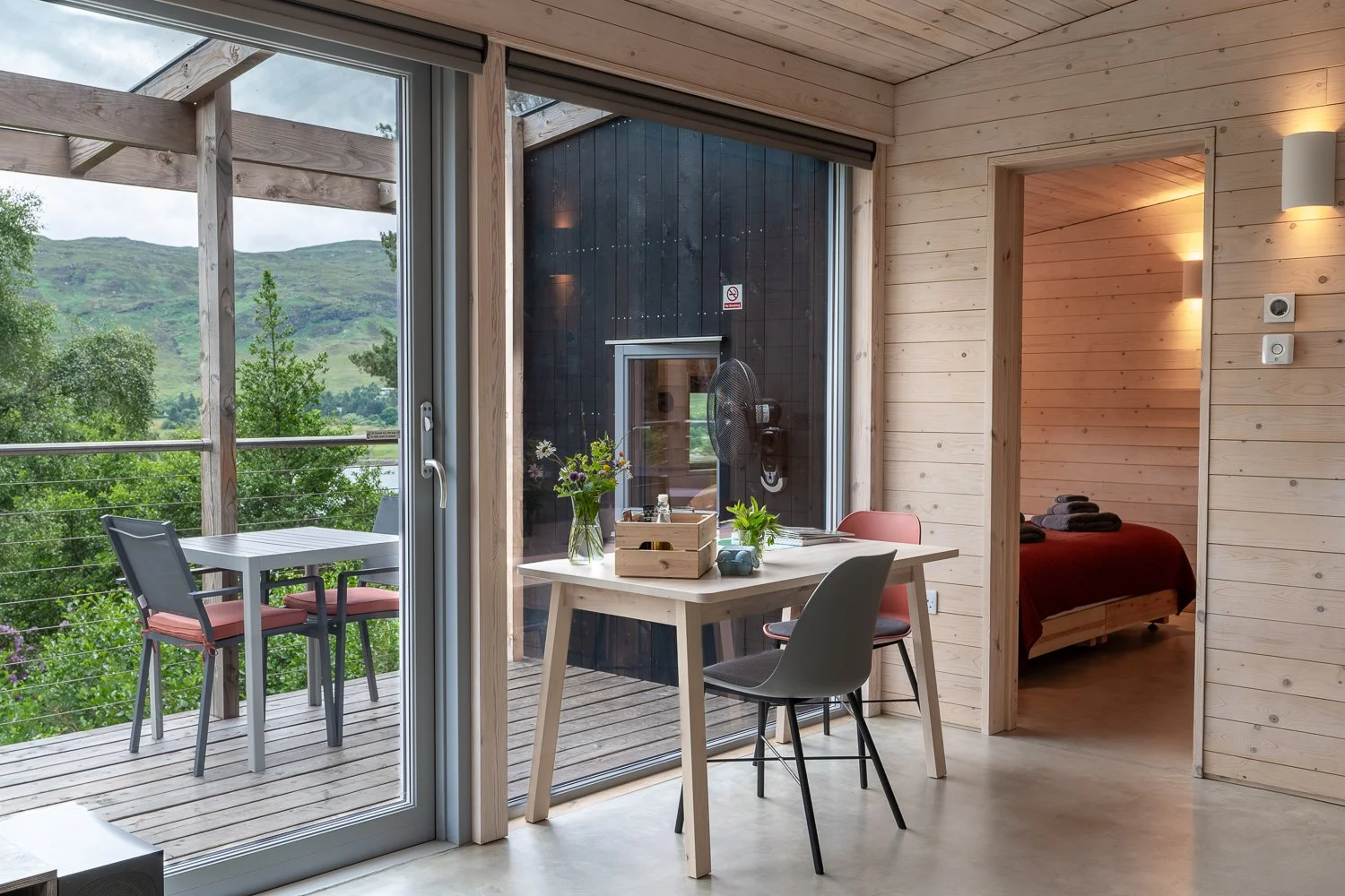 Dining area with floor to ceiling windows.jpg