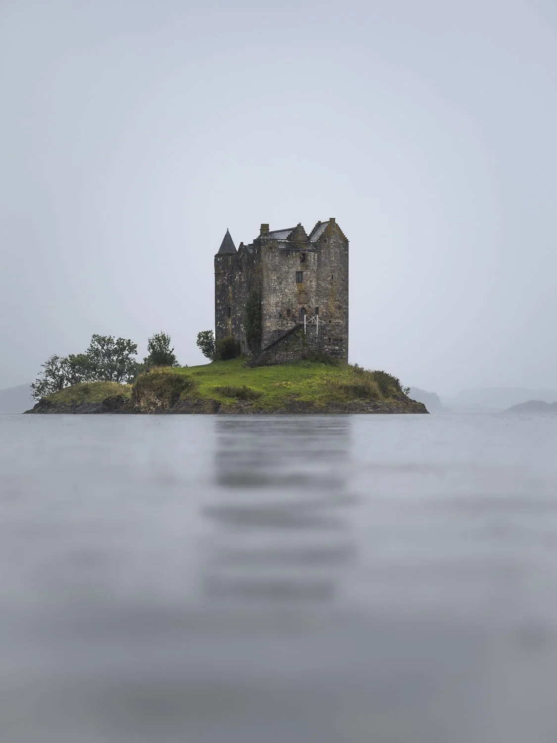 Castle Stalker on a moody grey day.