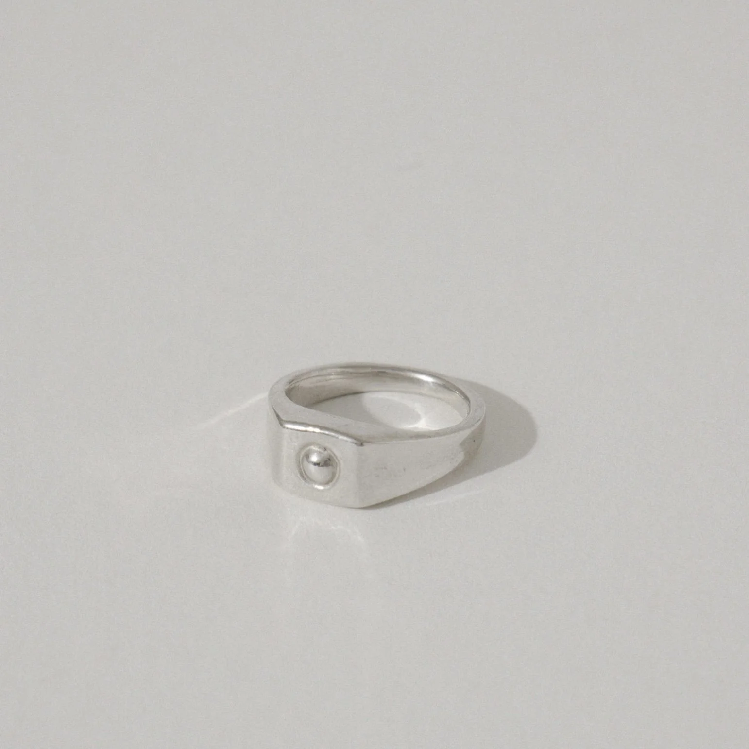dot-signet-ring-silver_155-1543x2048 2.jpg