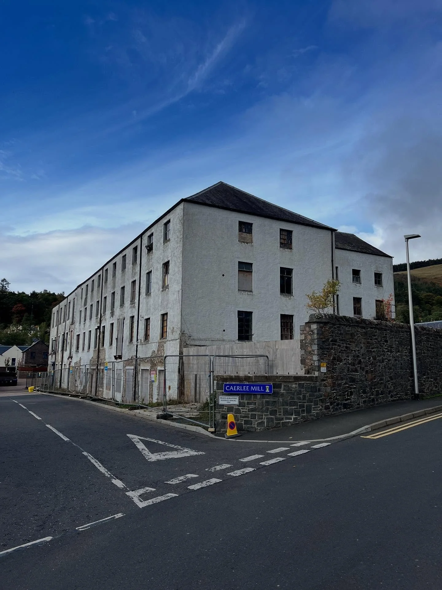 I heard the unmistakable sound of machinery and heavy plant coming from behind the fences at Caerlee Mill today.  Demolition will begin any day now, before work begins on a brand new innovation centre. 

It goes to ground a fairly unloved and very ti
