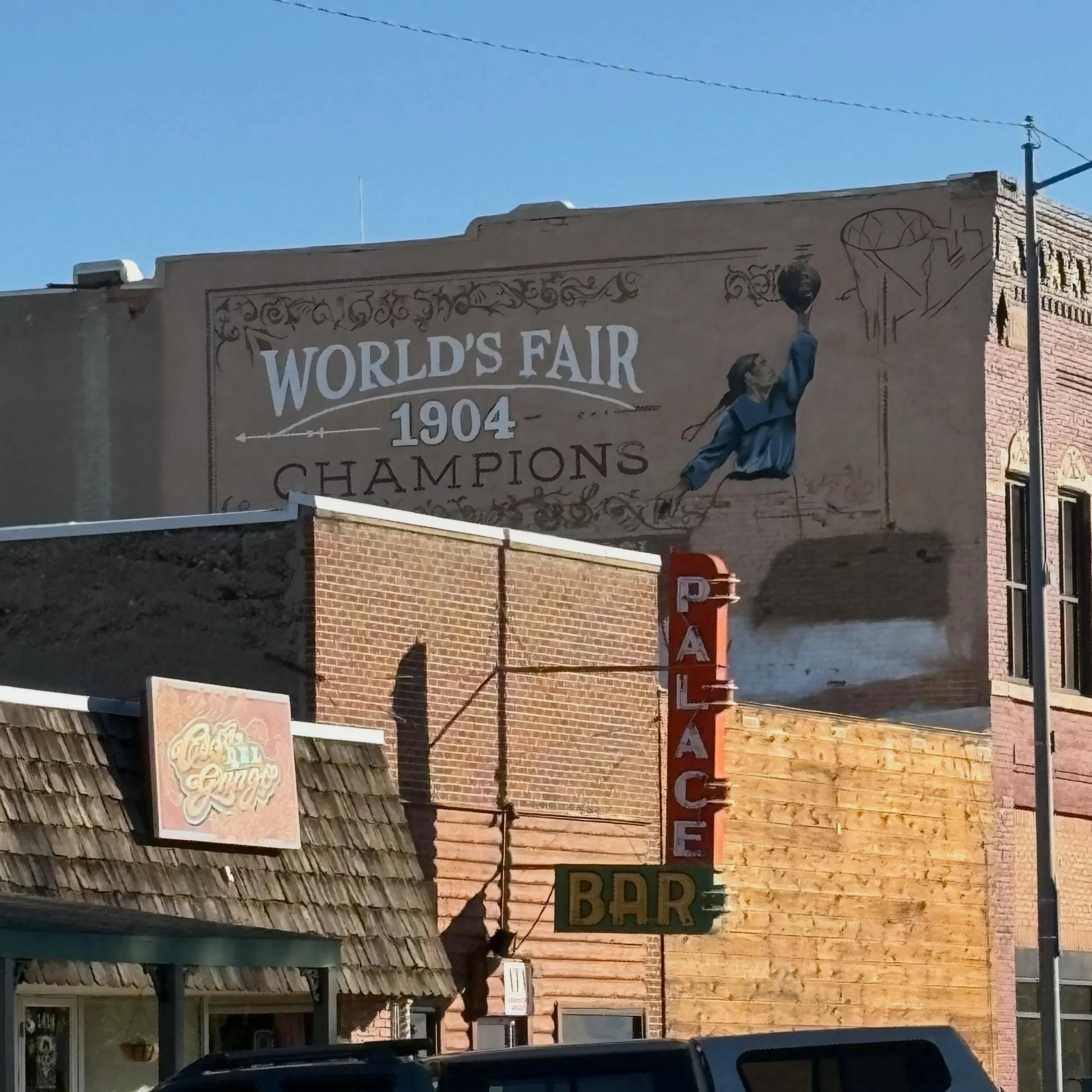 ~Fort Benton Friday~

New mural going up by Rilie Tane Zumbrennen. It is dedicated to the 1904 World&rsquo;s Fair Champion girls&rsquo; basketball team from the Fort Shaw Indian School. The team played an exhibition game on the 2nd floor of the Bento