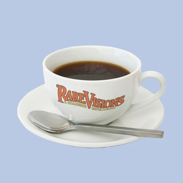 Coffee cup with Rare Visions and Roadside Revelations logo