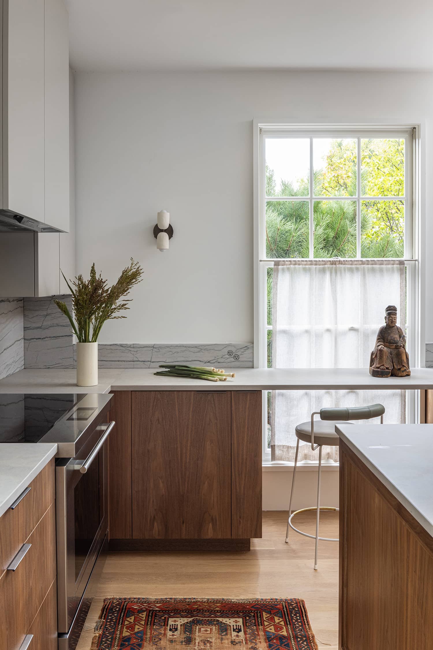 modern breakfast bar in front of window designed by Fowlkes Studio in Washington DC