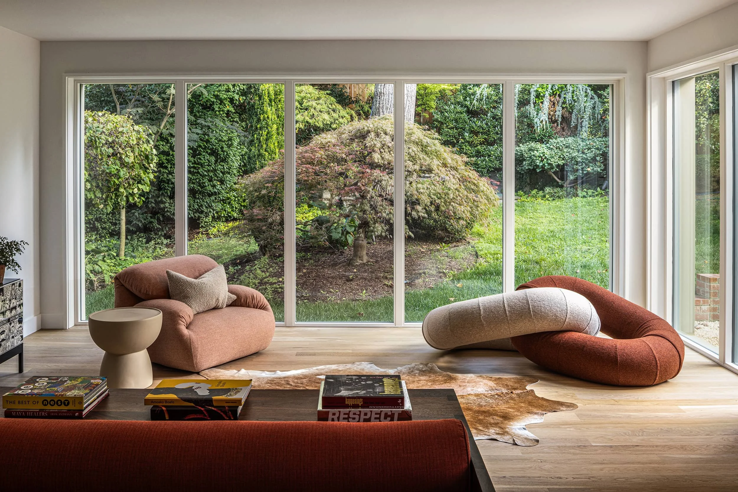 Light filled extension lounge with link & loop sofa by Fowlkes Studio in Washington, DC
