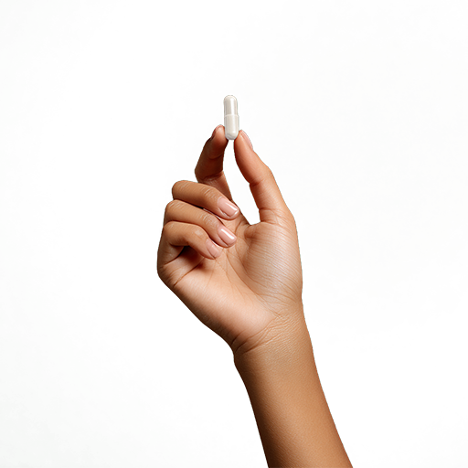 A hand holding a CeroMulti capsule.