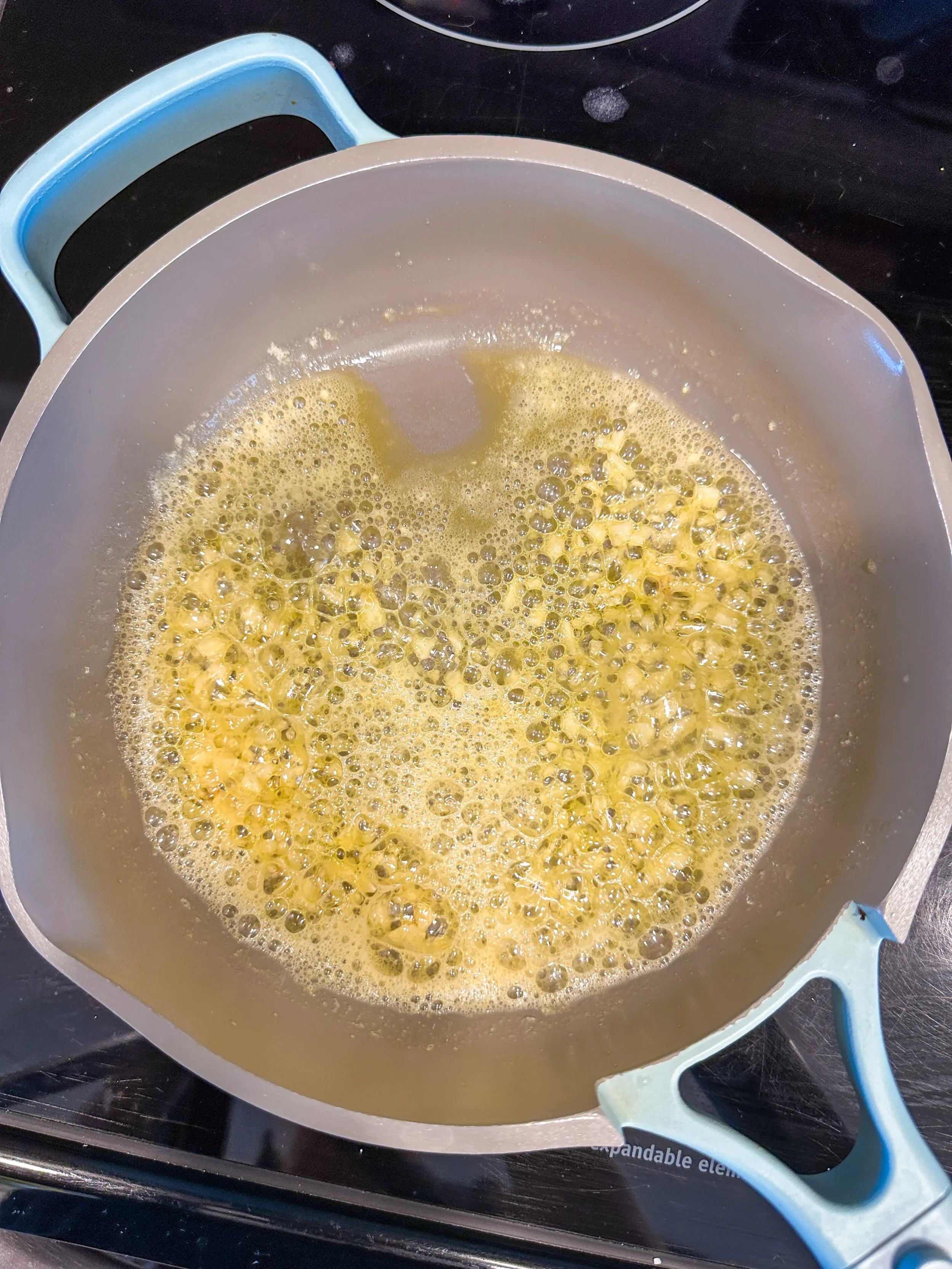 butter and garlic cooking in a pan